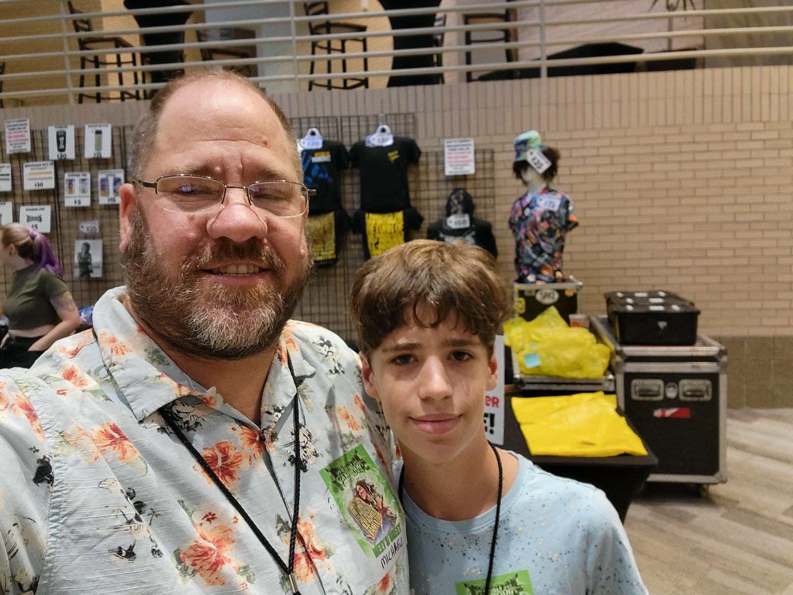 Thomas and me at the merch table