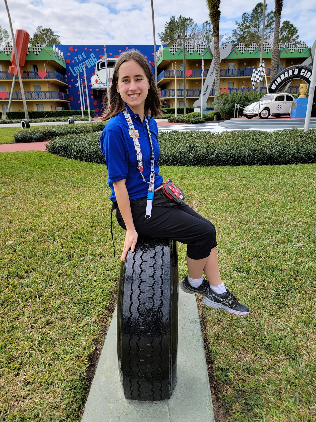 Lisa taking a break on a giant tire