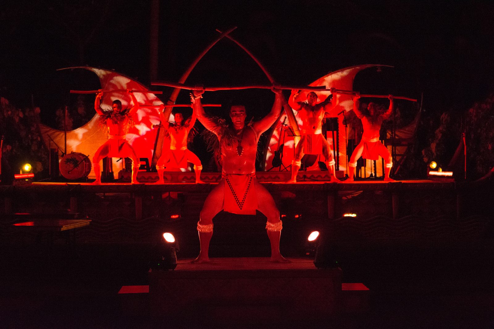 The luau stage lit red