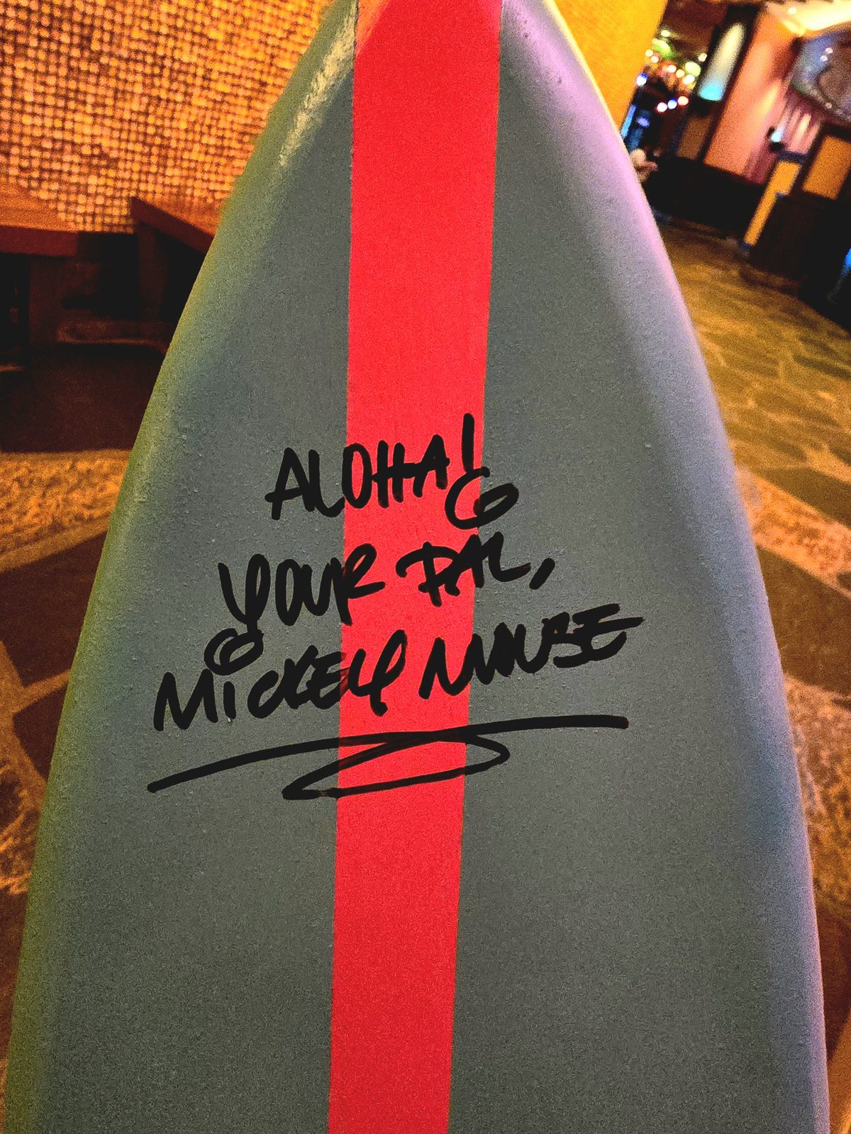 Mickey's signature on Lisa's surfboard, Aloha your pal
