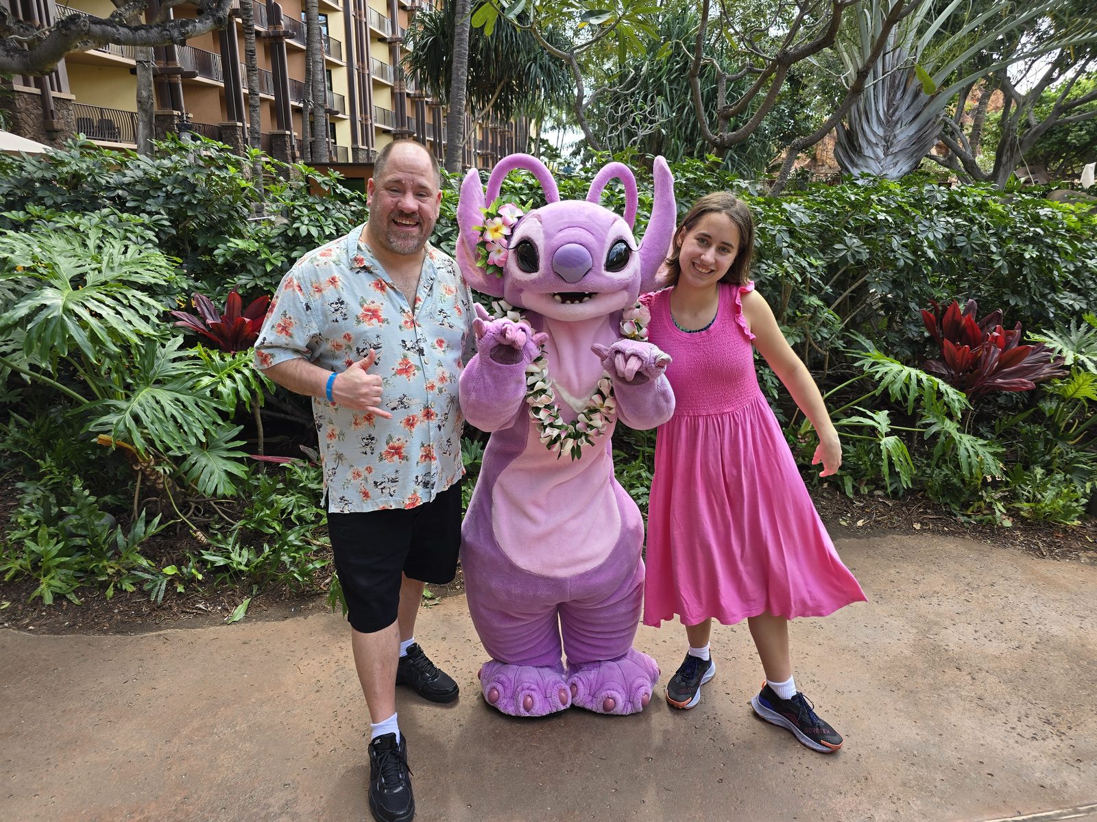 Michael, Angel in her flower lei and Lisa at Aulani