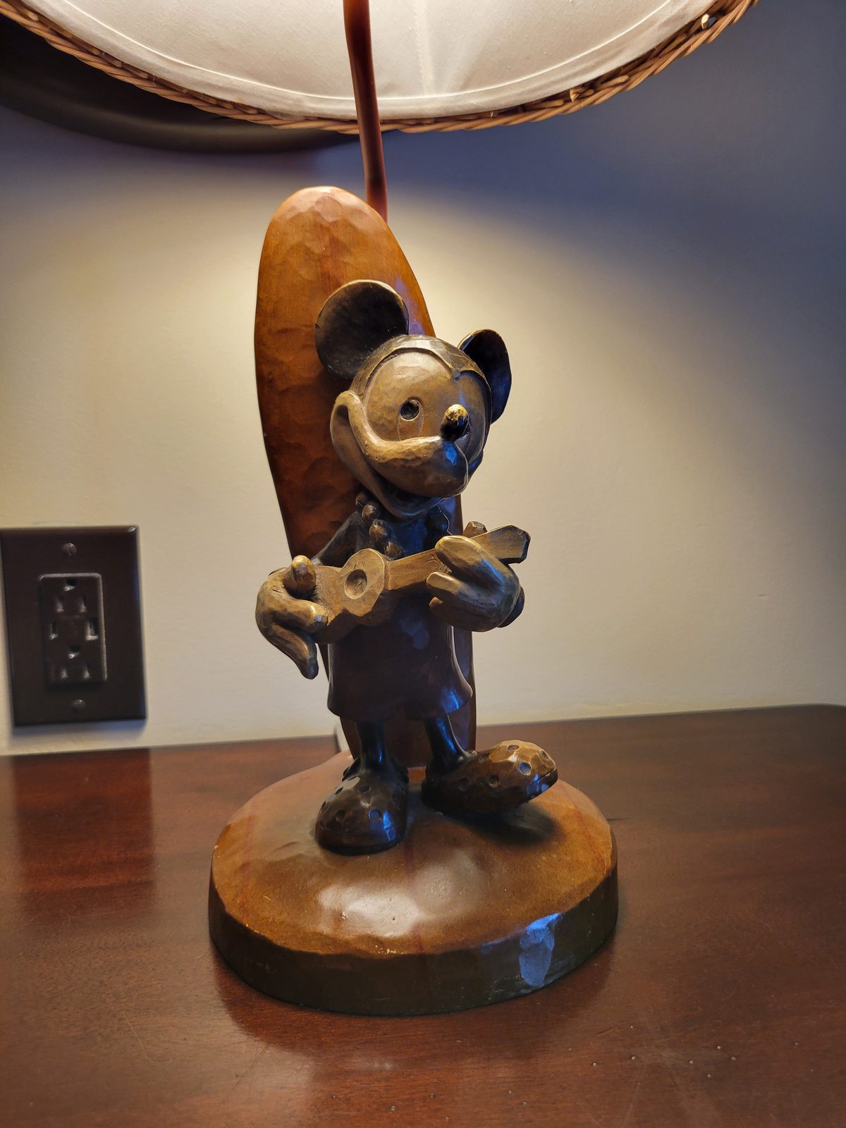 The wooden Mickey surfer in our room
