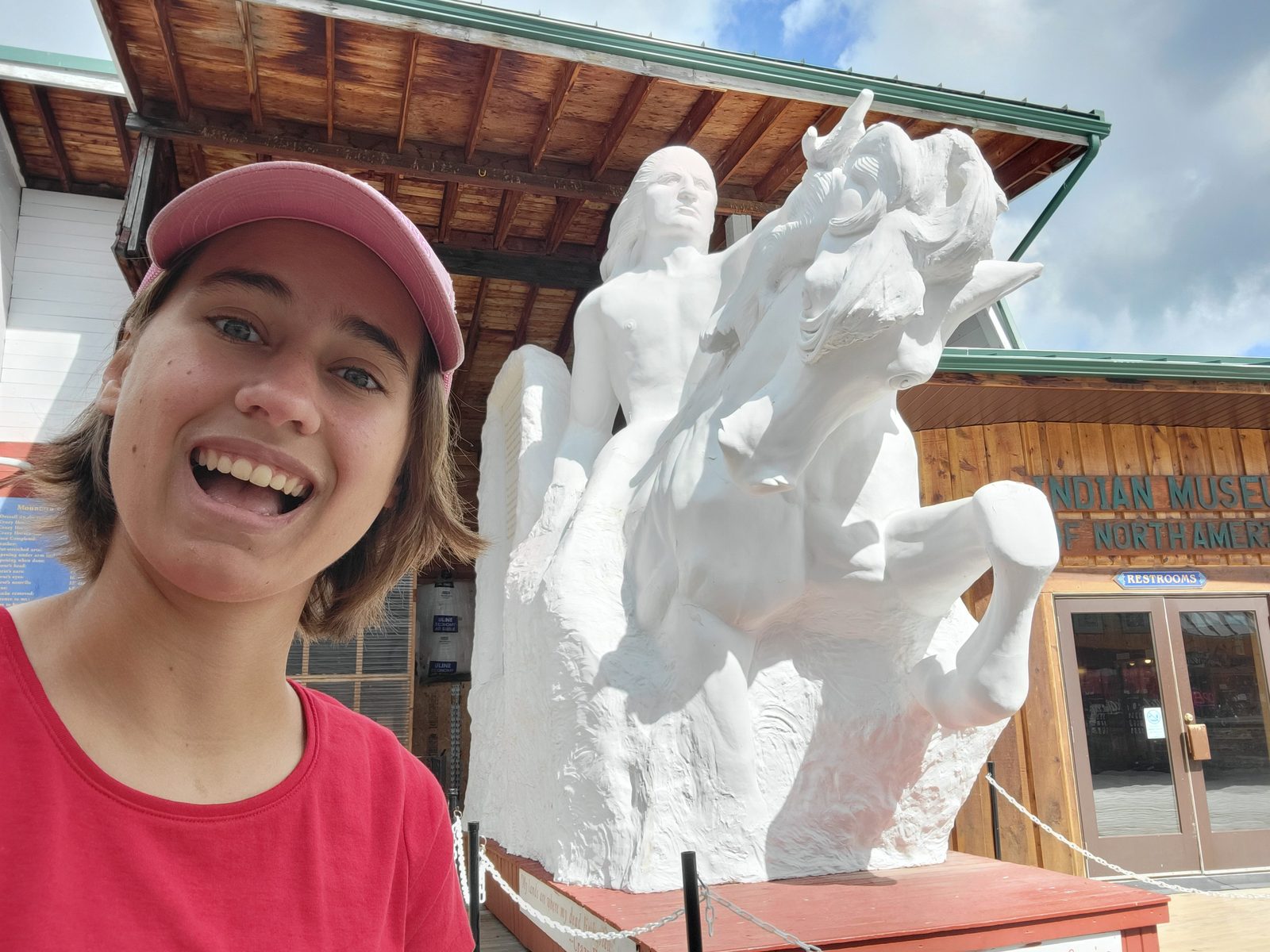 Lisa by the scale model of the finished monument