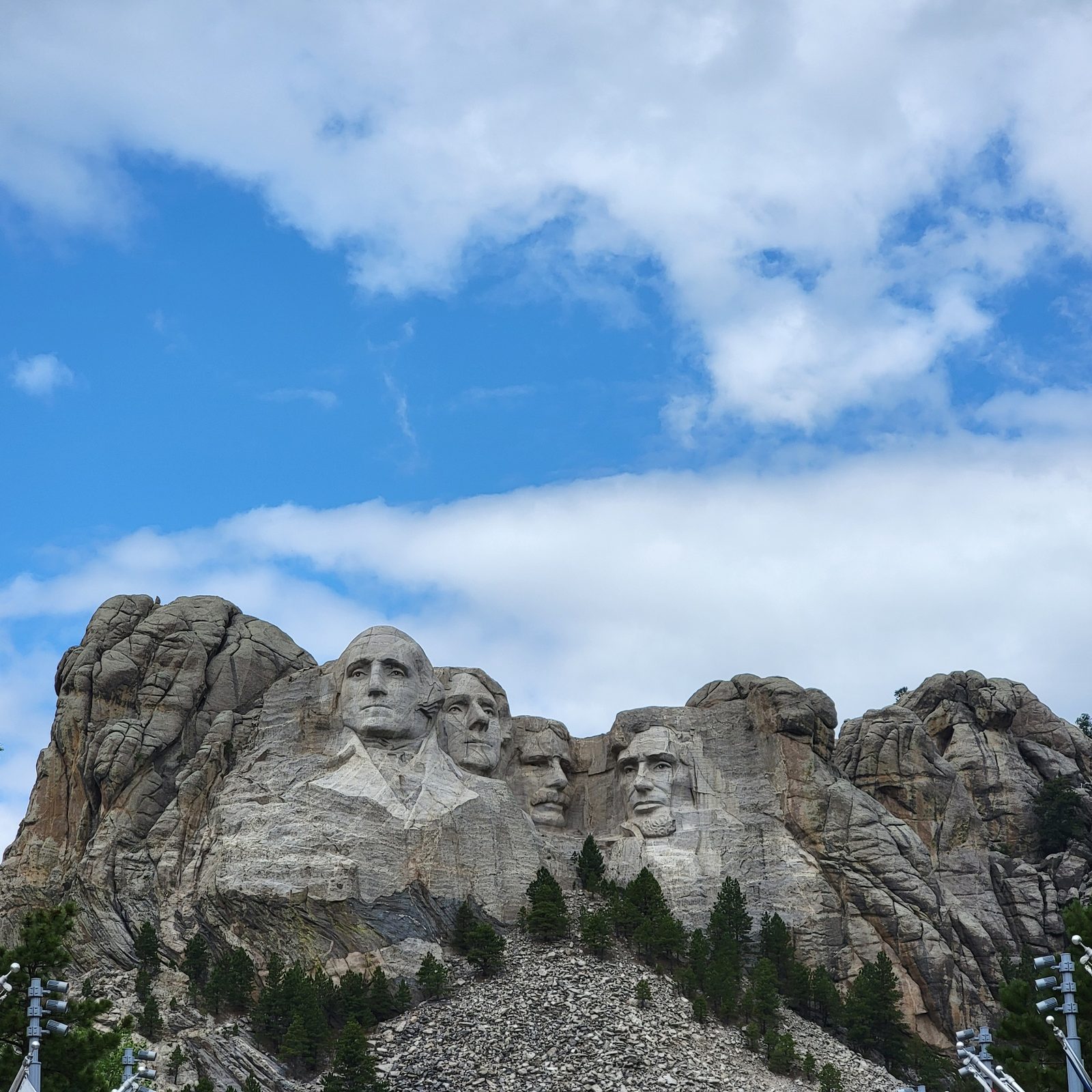 Mount Rushmore from below under the clouds