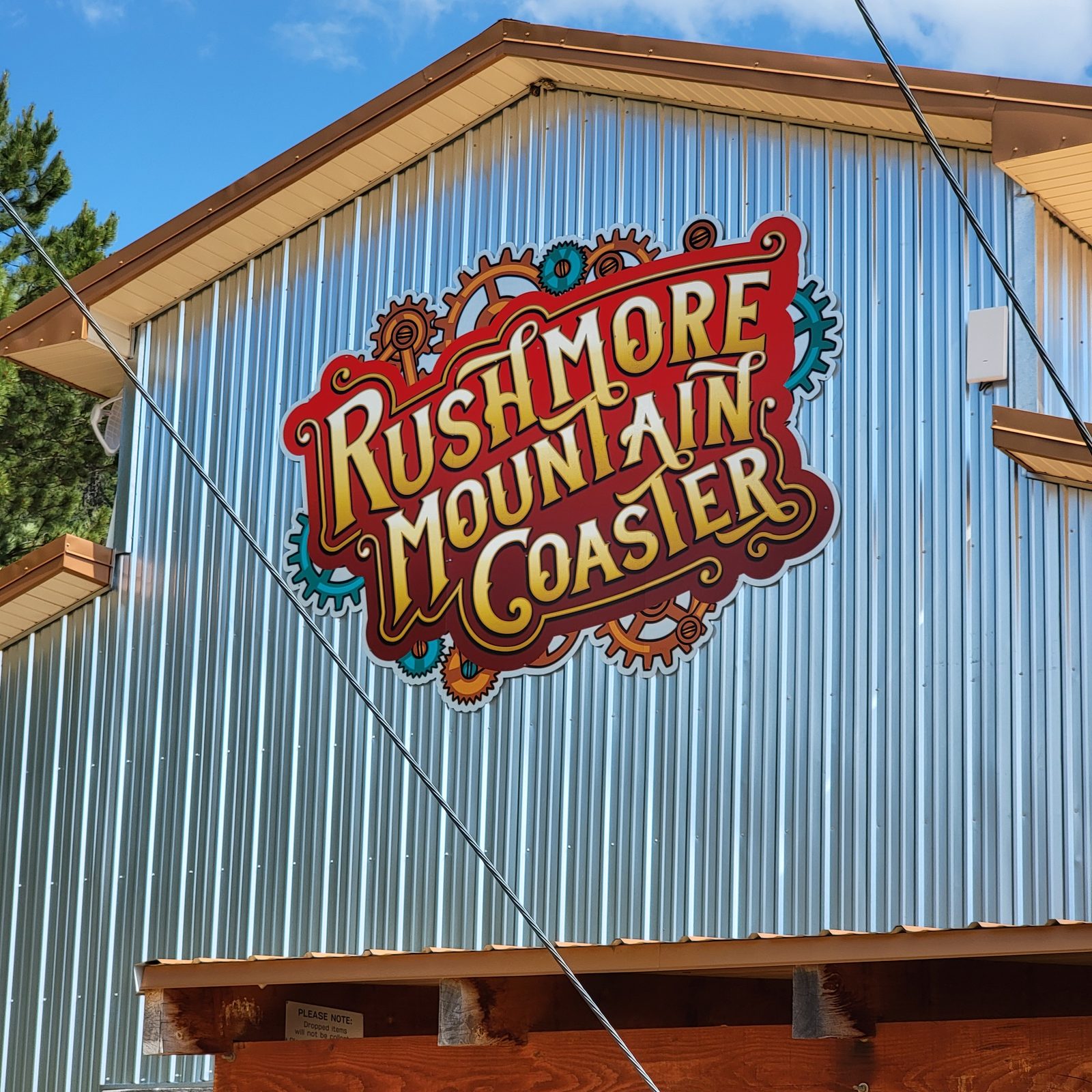 The Rushmore Mountain Coaster sign at Rush Mountain