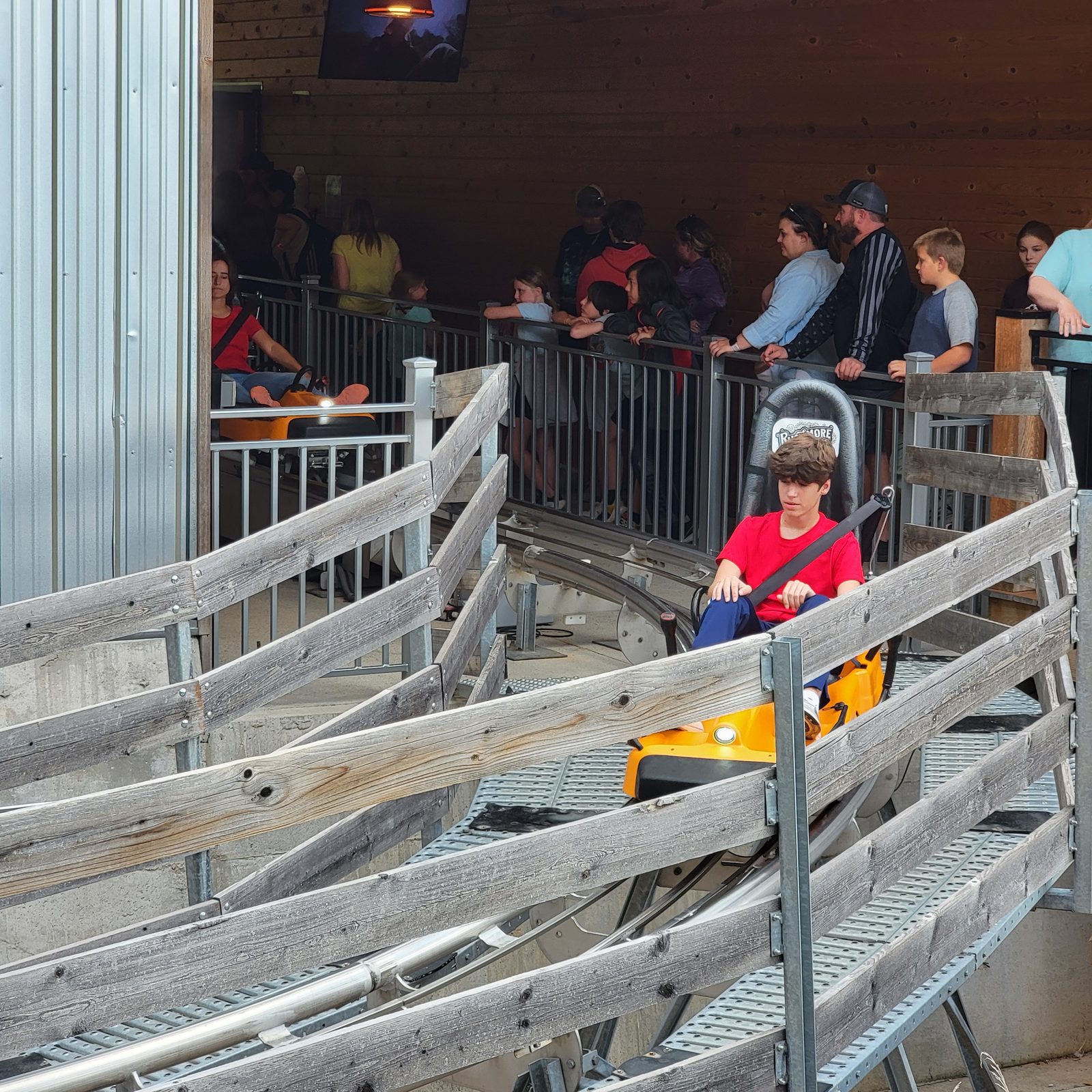 Lisa and Thomas riding the mountain coaster downhill