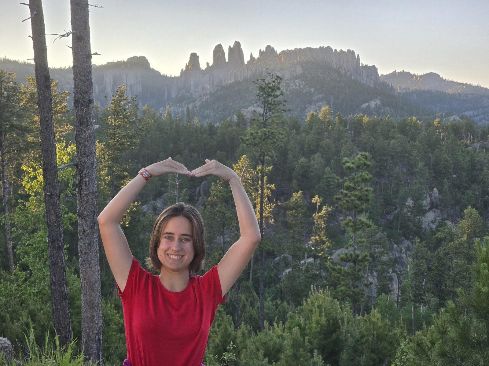 Lisa makes a heart in the Black Hills