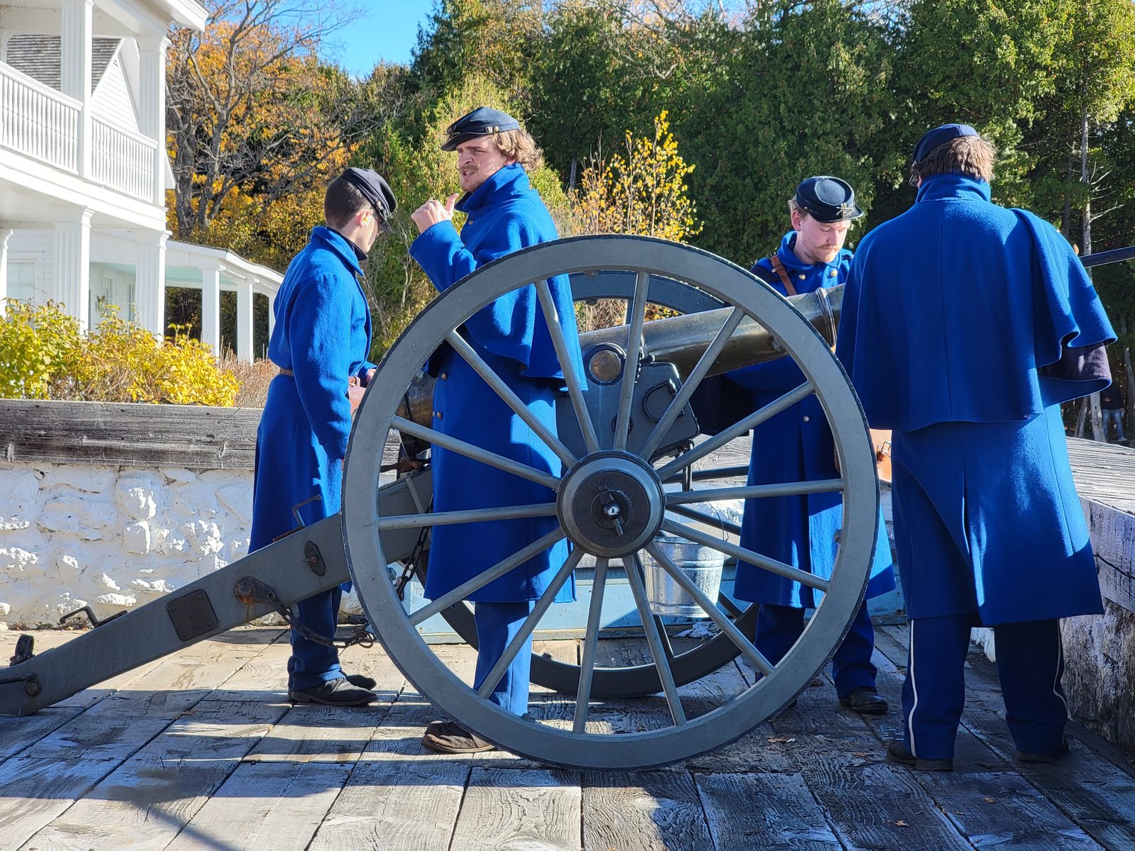 A cannon crew in period uniform
