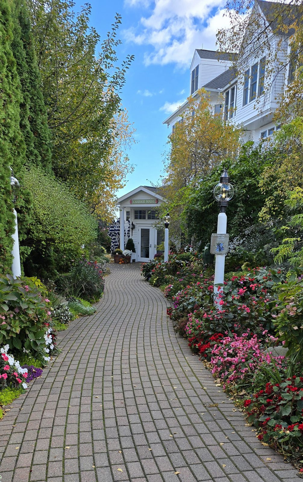 A brick path lined with flowers on Mackinac Island