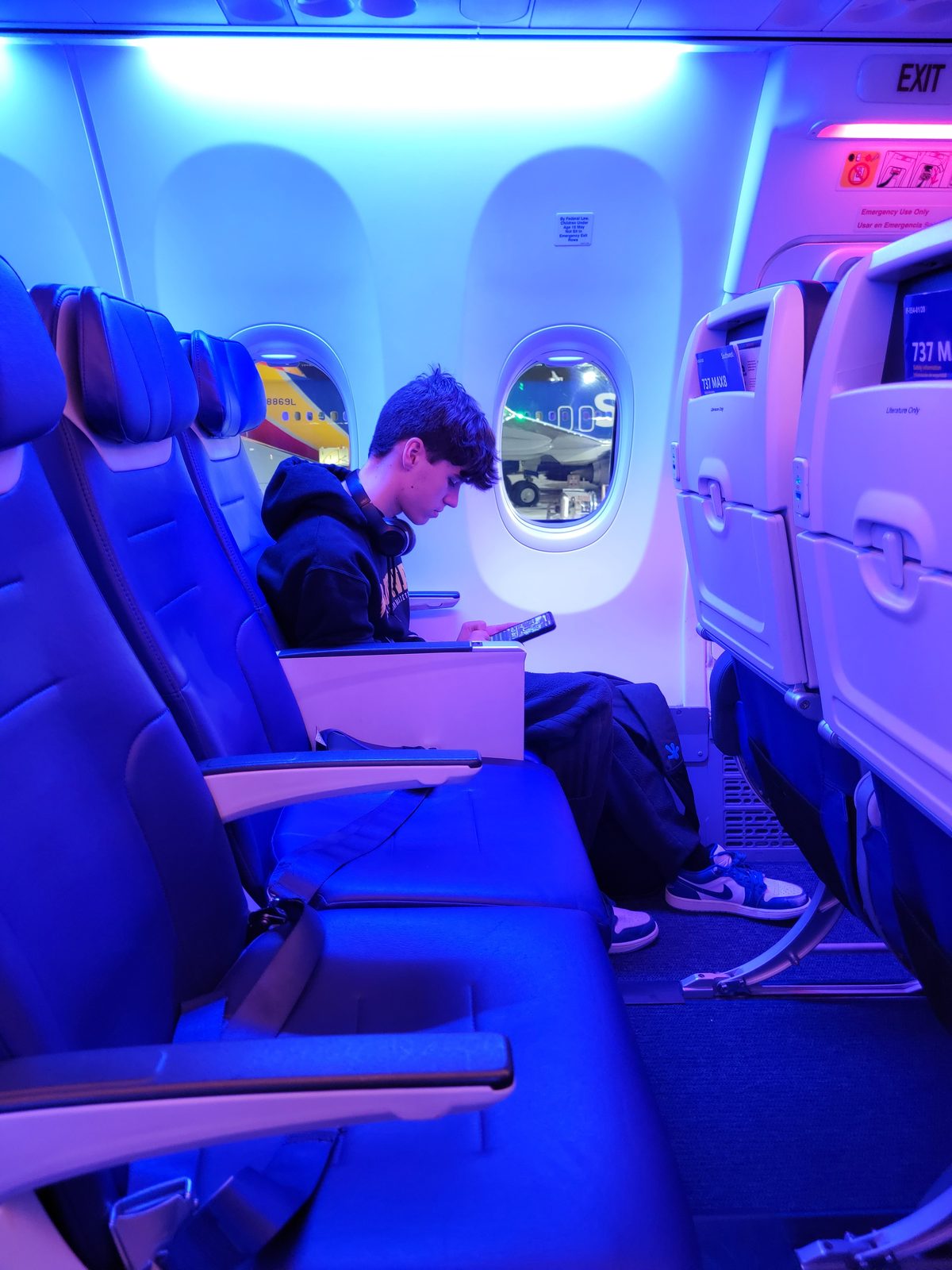 Thomas settled in on our flight to Orlando
