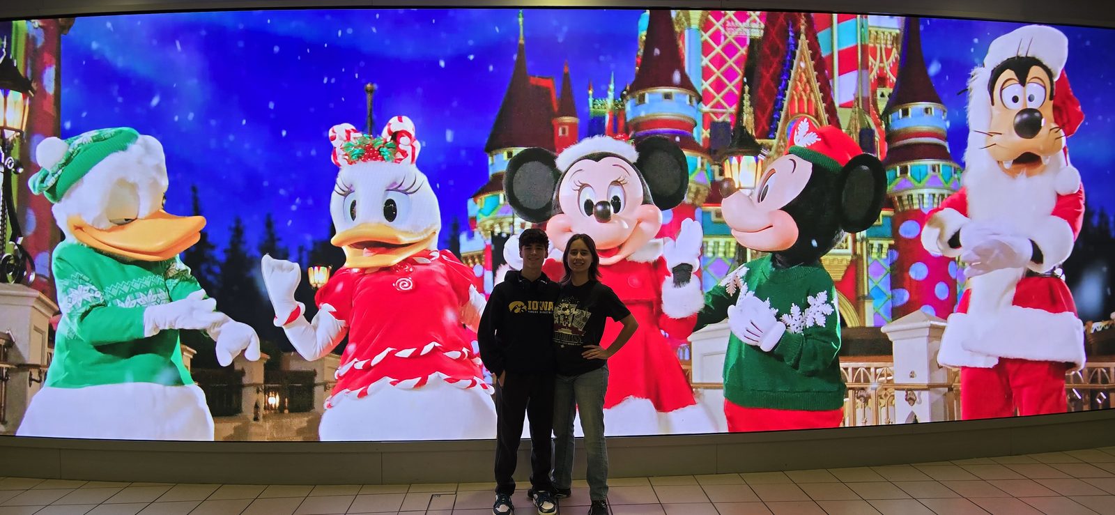 Lisa and Thomas with Mickey and friends