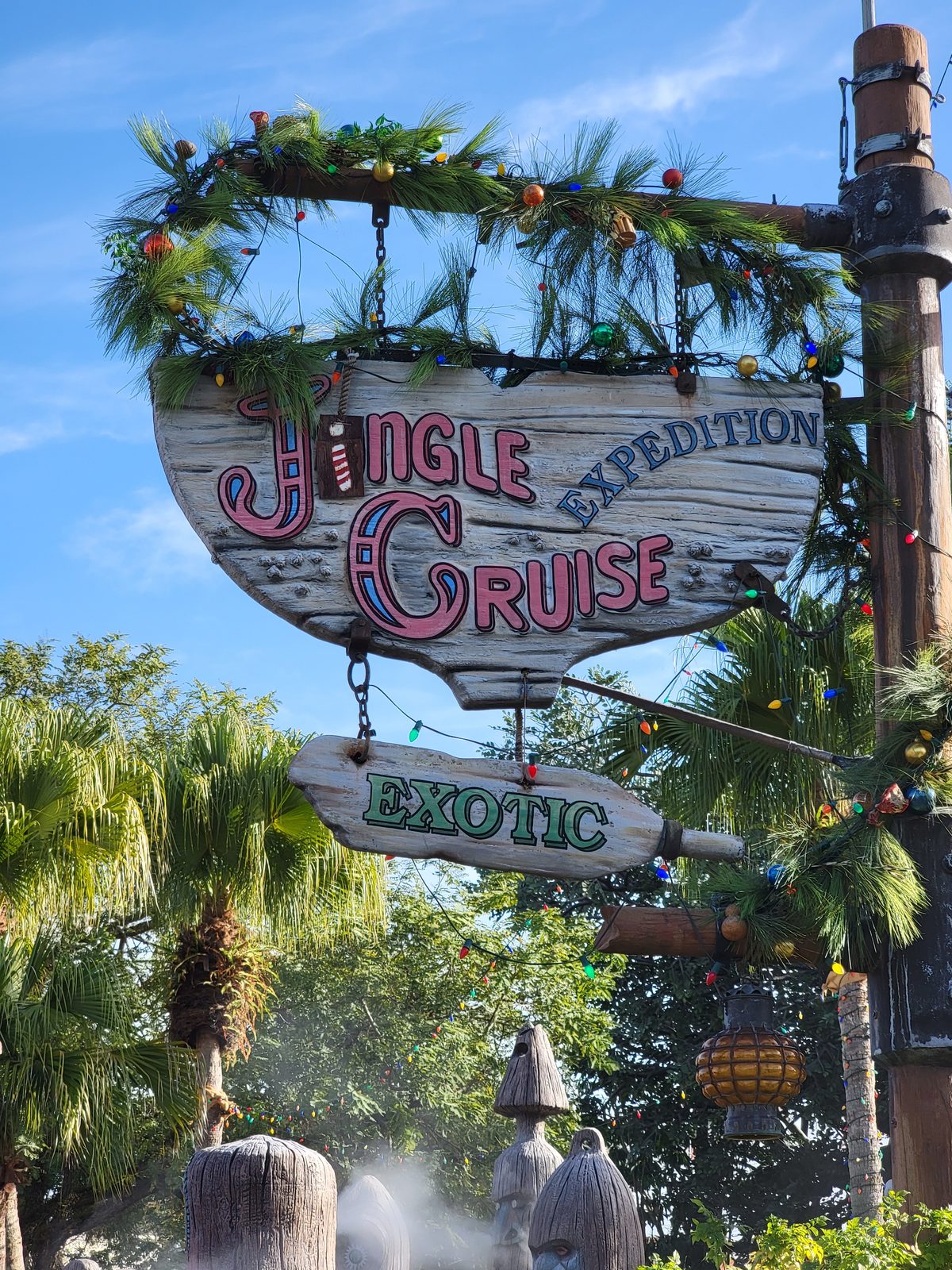 The Jingle Cruise sign decked out for the holidays