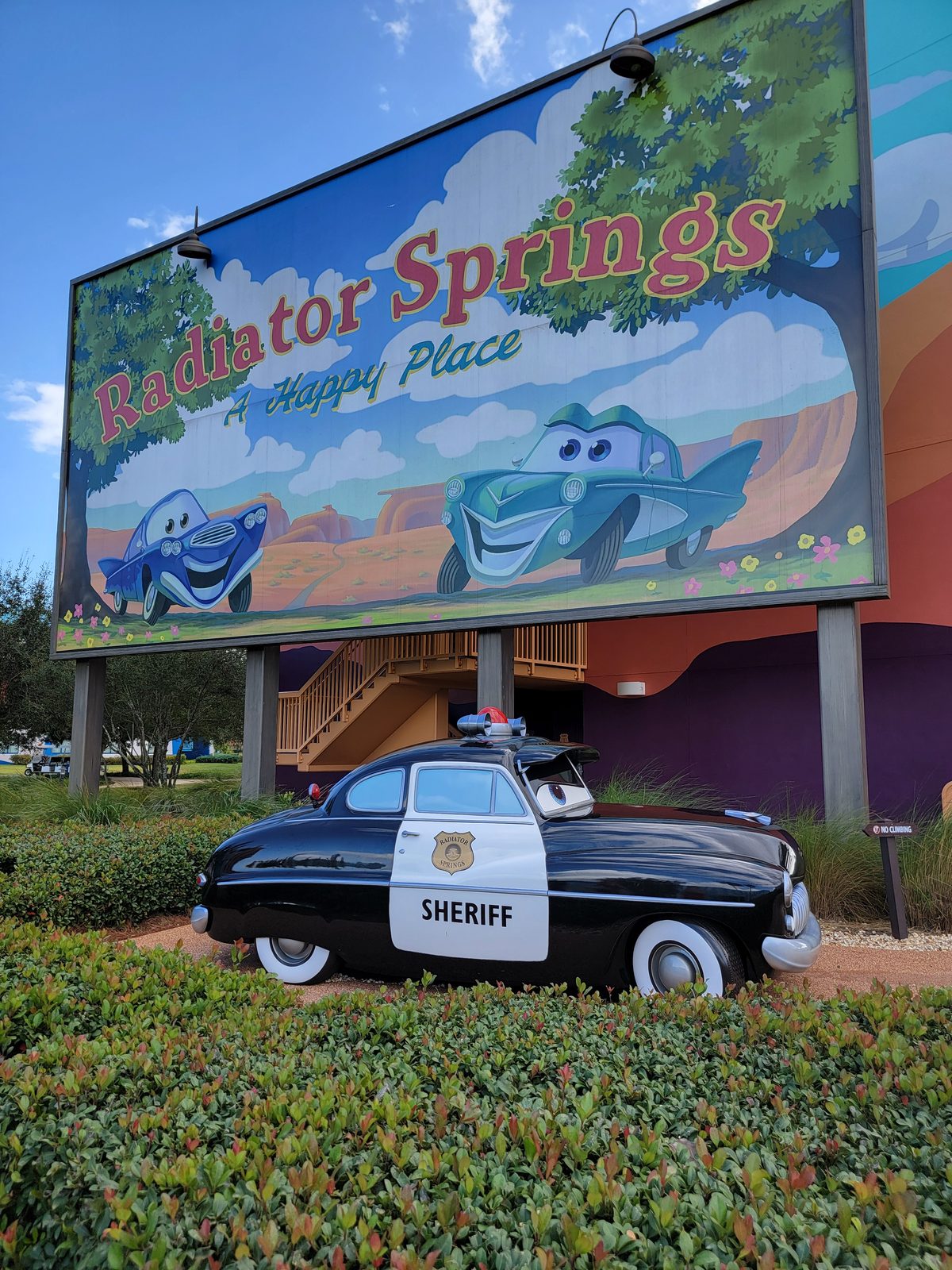Sheriff and the Radiator Springs sign at Art of Animation