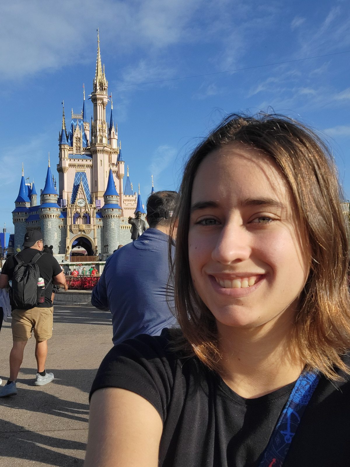 Lisa with Cinderella Castle behind her