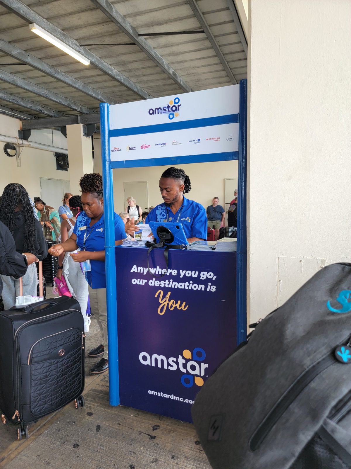 Checking in at the Amstar transfer desk