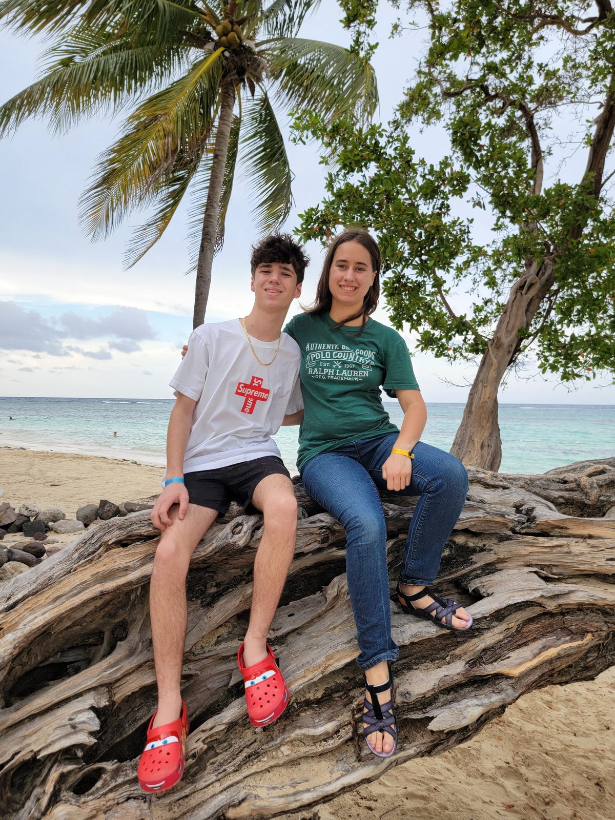 Thomas and Lisa on the big driftwood at Mammee Bay