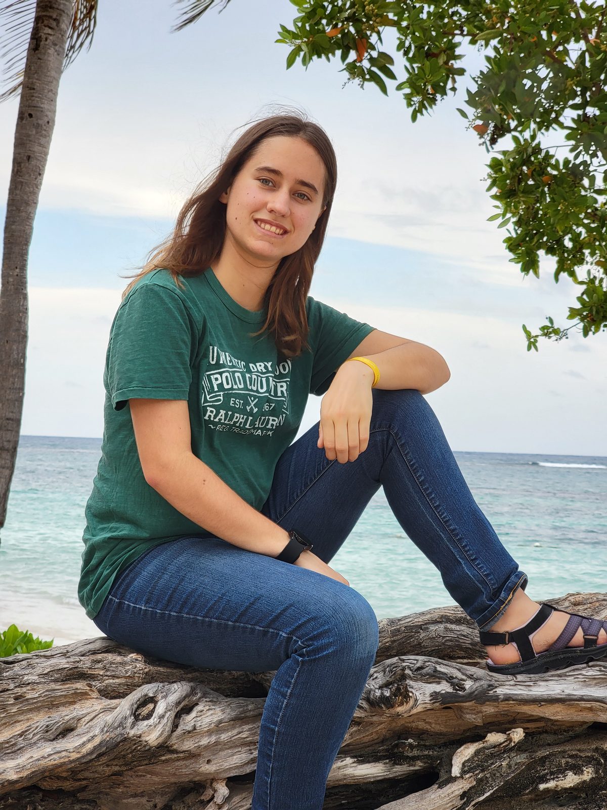 Lisa on the driftwood at Mammee Bay
