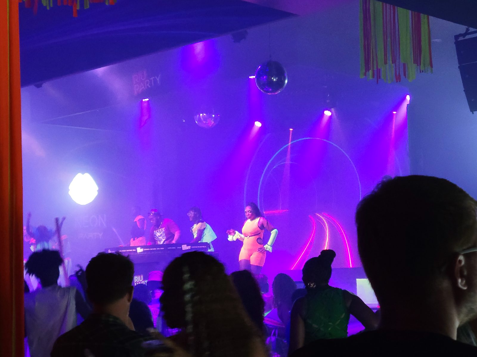 Watching the RIU Party show under neon lights