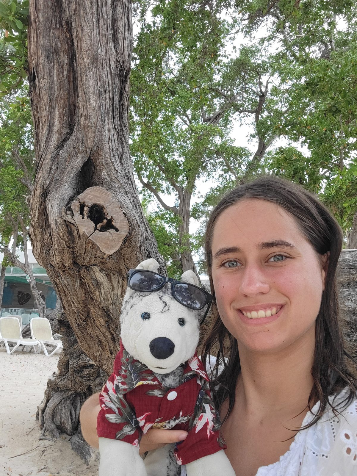 Lisa and Bob by the trees at our resort