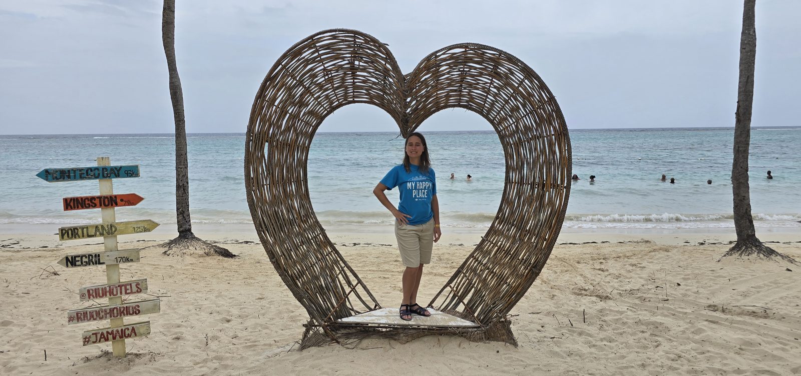 Lisa in the heart on the beach at the Riu