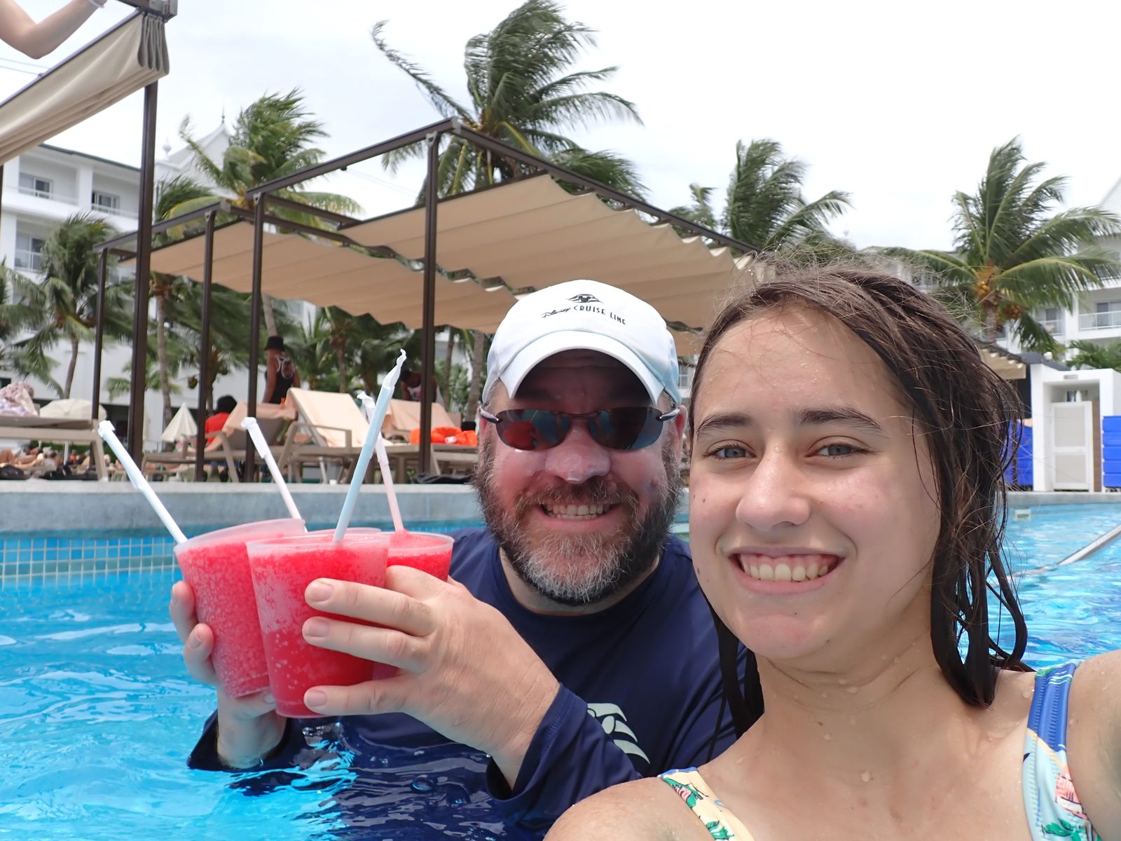 Lisa and Michael with frozen drinks by the pool
