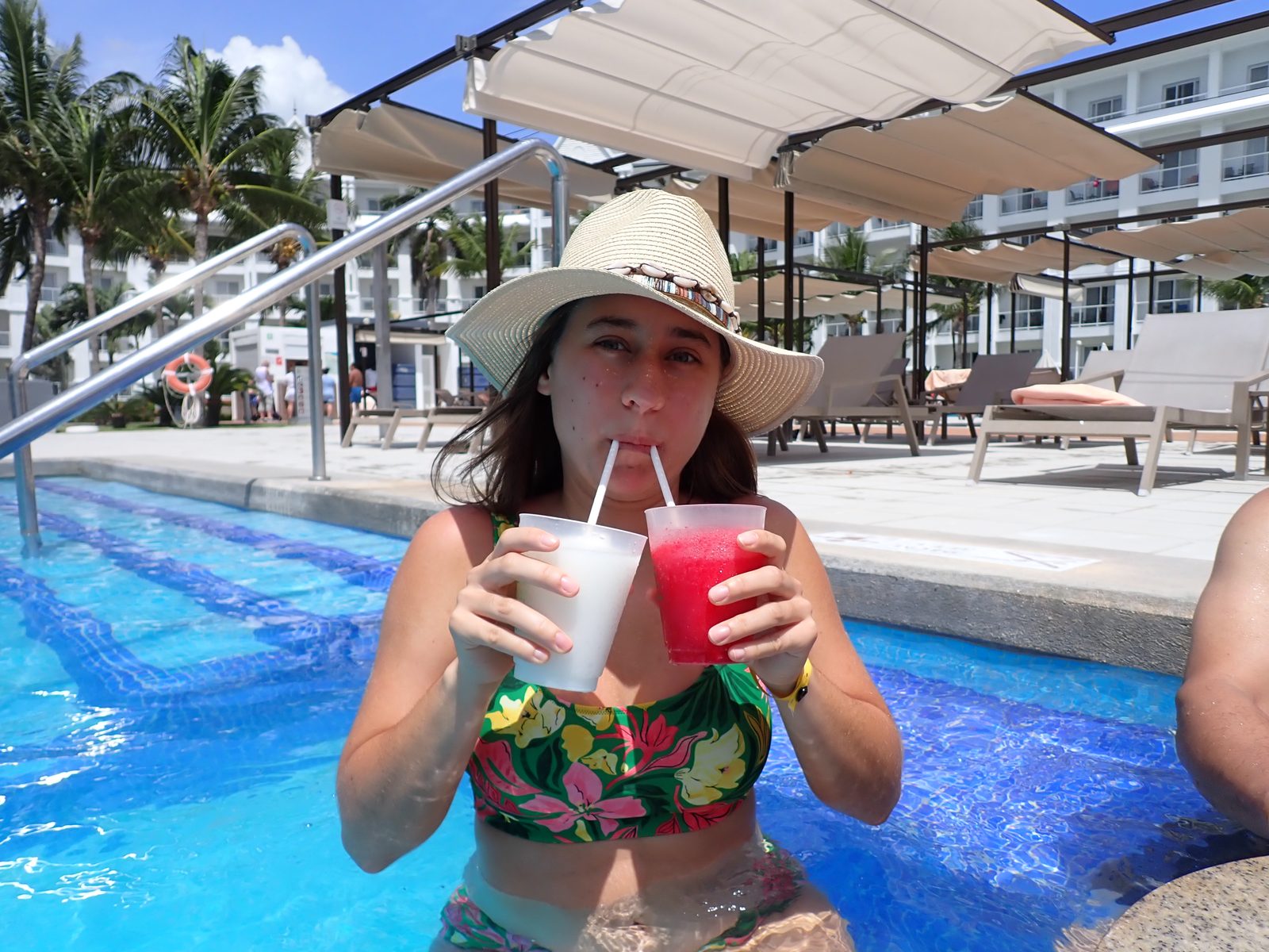 A red drink by the pool