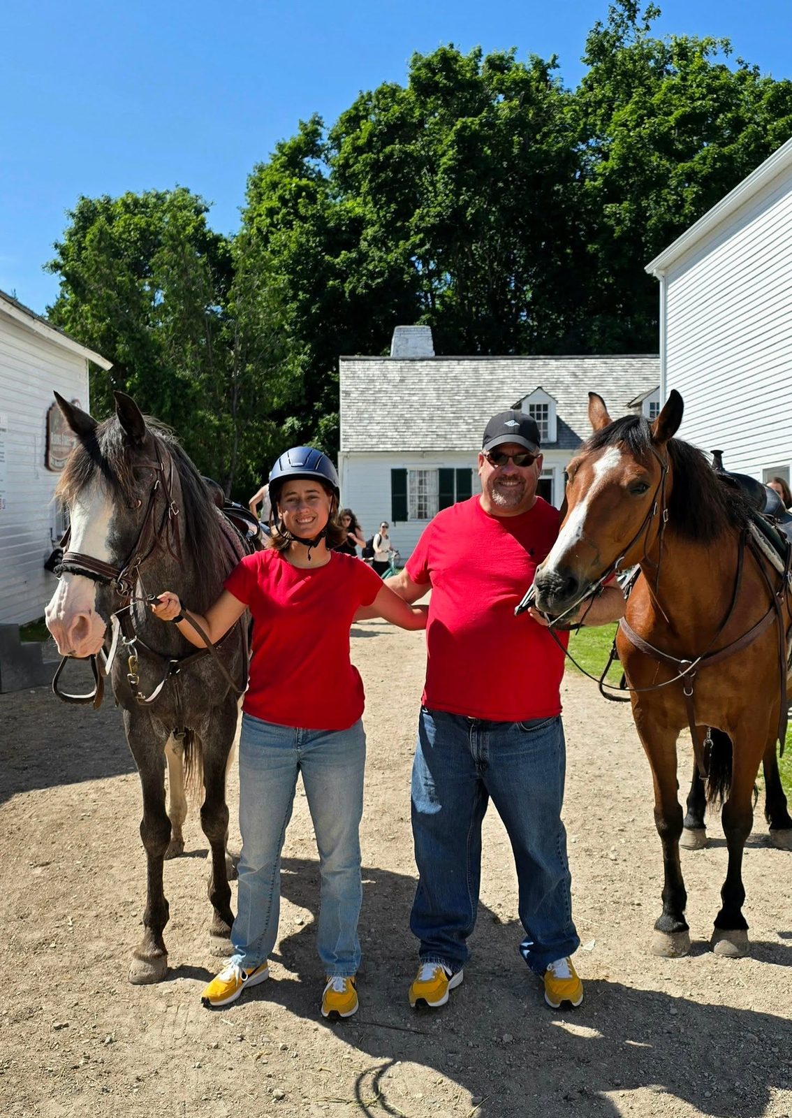 Michael and Lisa with their horses on Mackinac Island