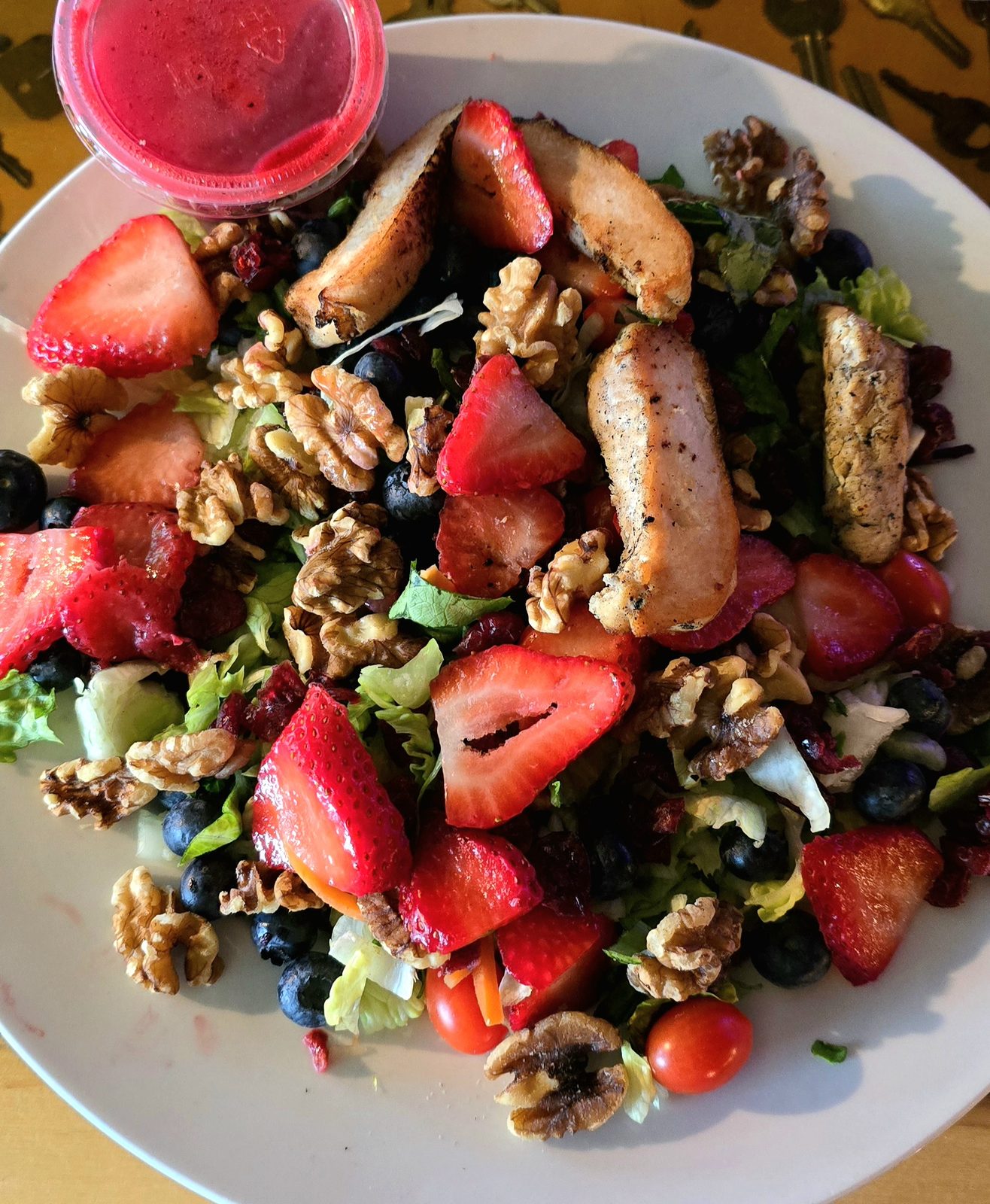 Our dinner salad with berries and walnuts