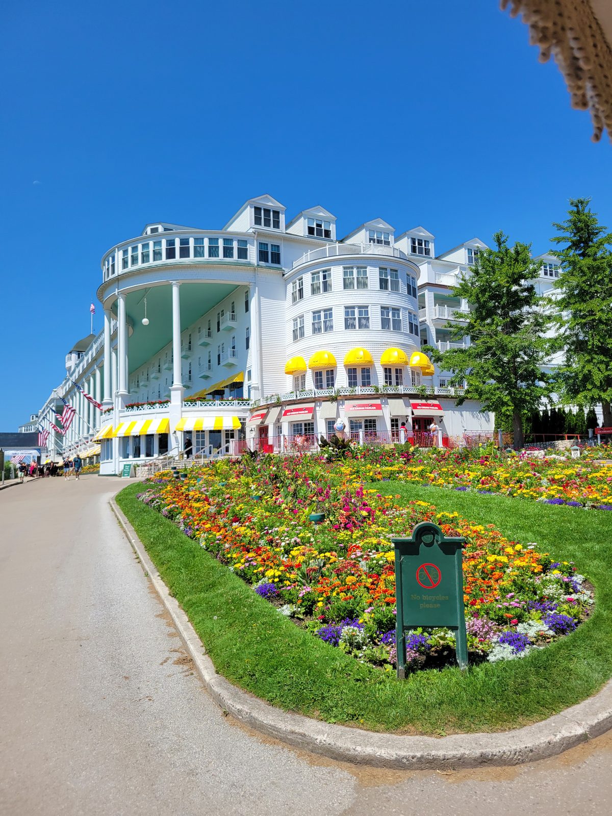 Passing the Grand Hotel by buggy