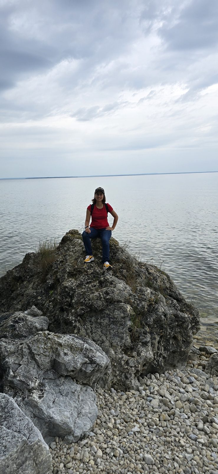 Lisa on the rocks along the shore