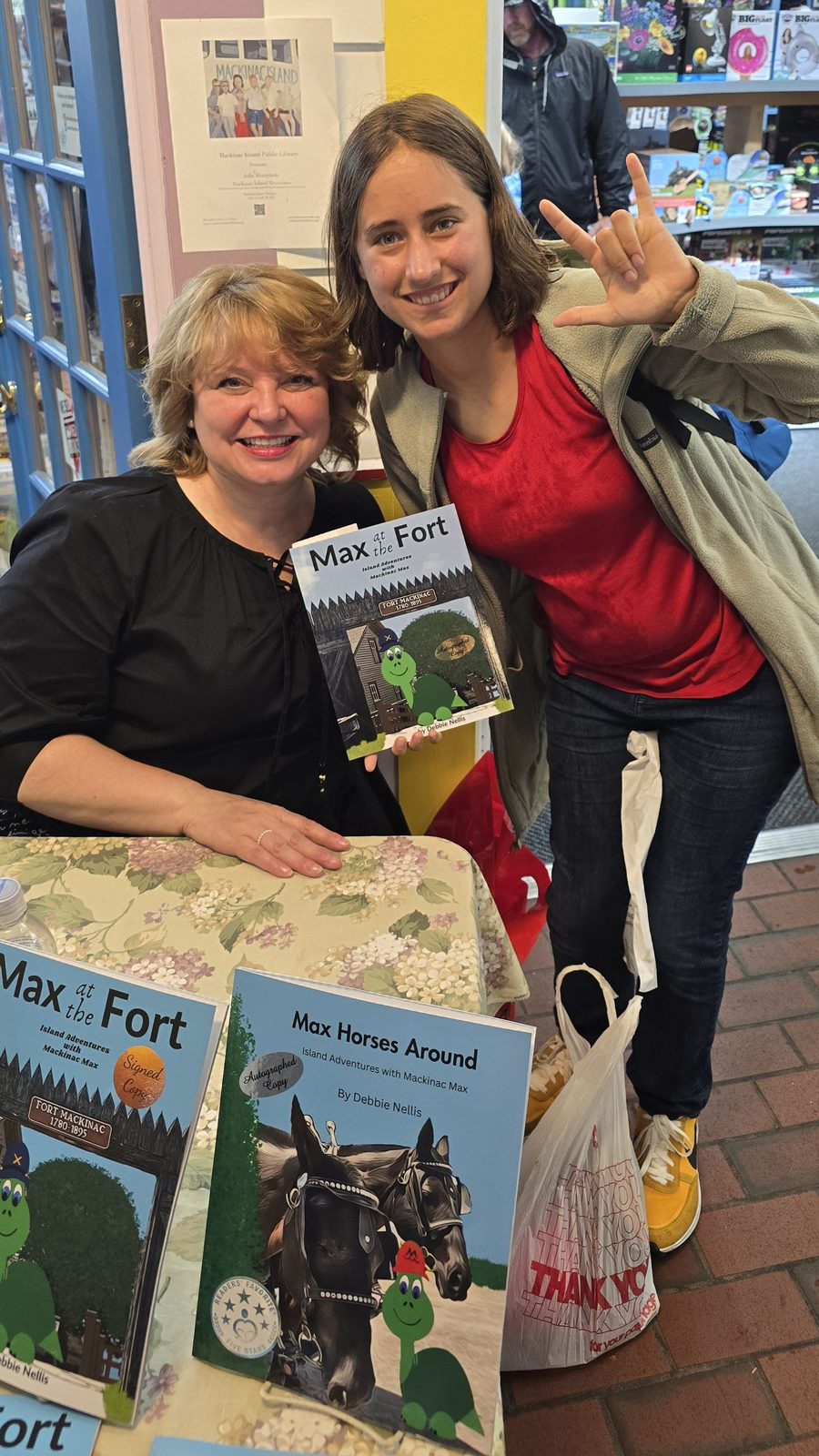 Lisa meets the author at the bookstore