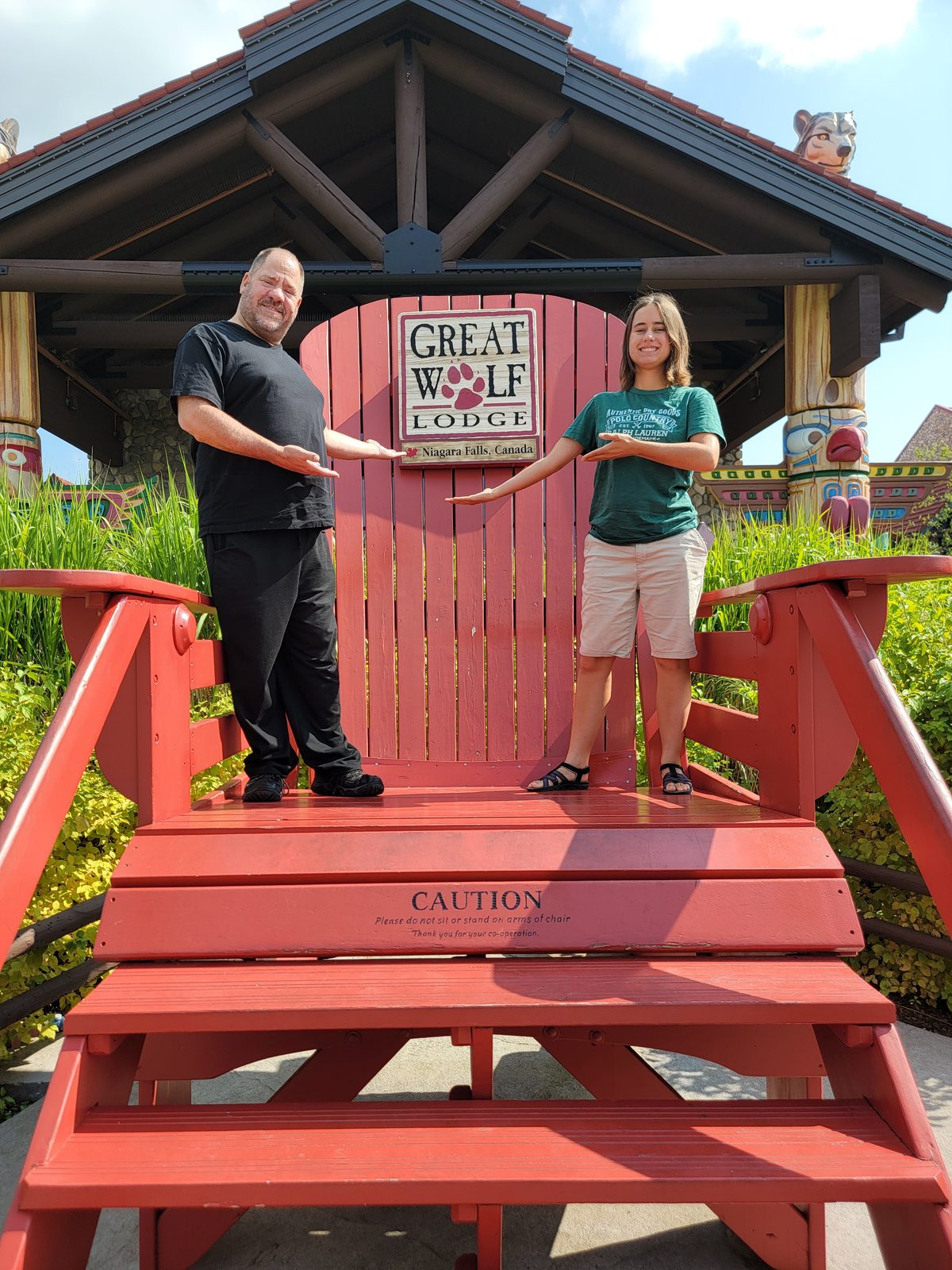 Lisa and Michael at the big red chair, Great Wolf Lodge