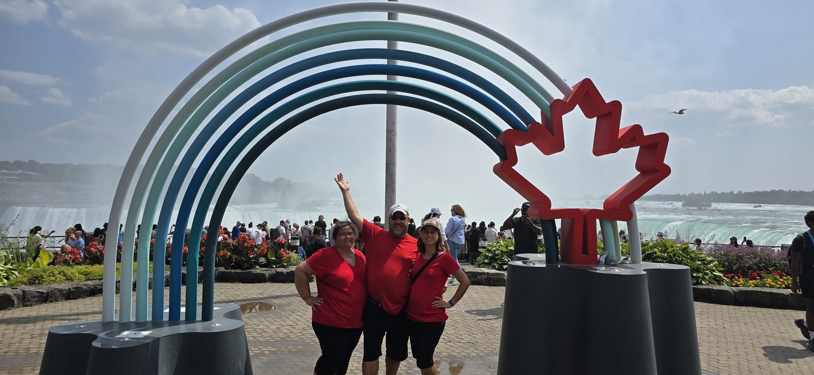 Posing under the Canada rainbow arch