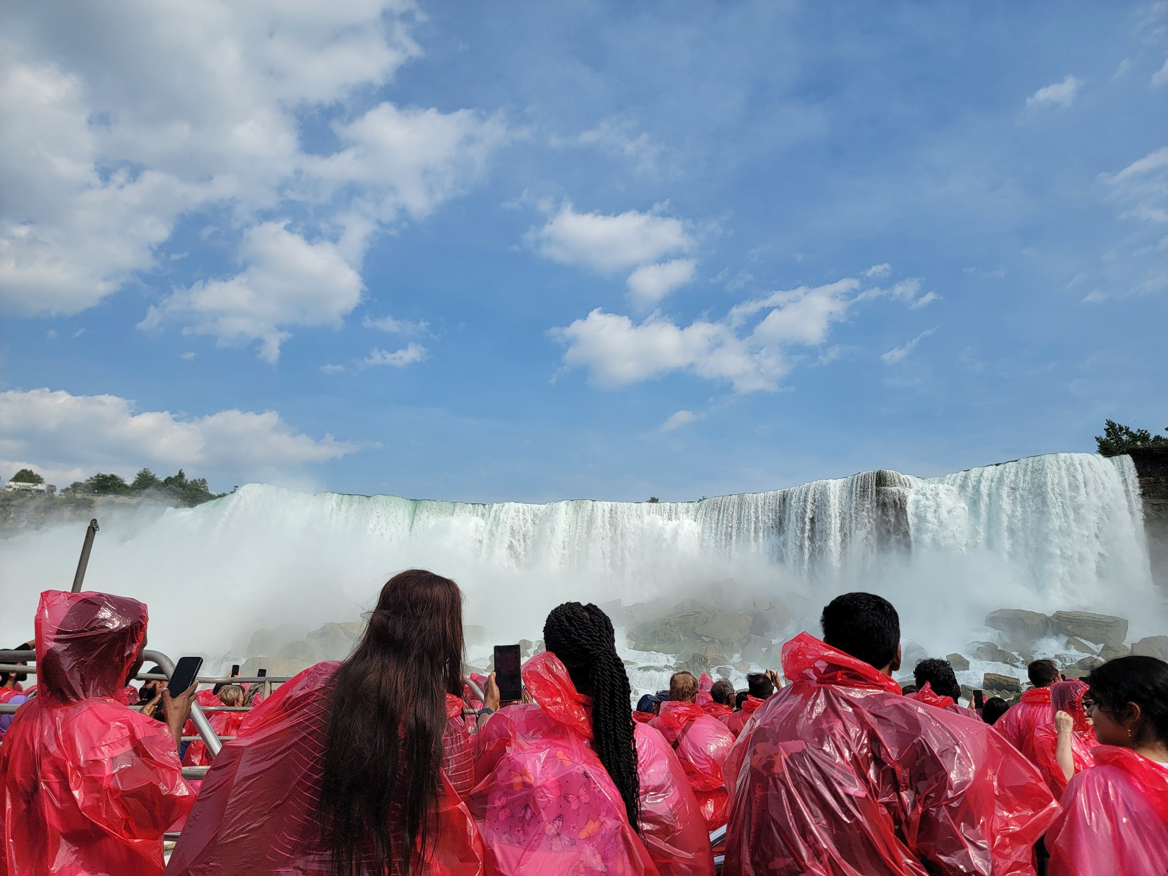 Red ponchos on the boat at the American Falls