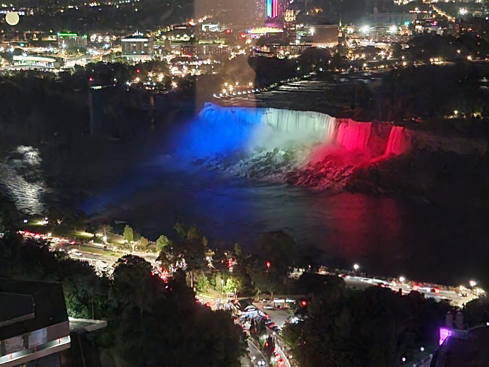 The falls lit up red, white and blue at night