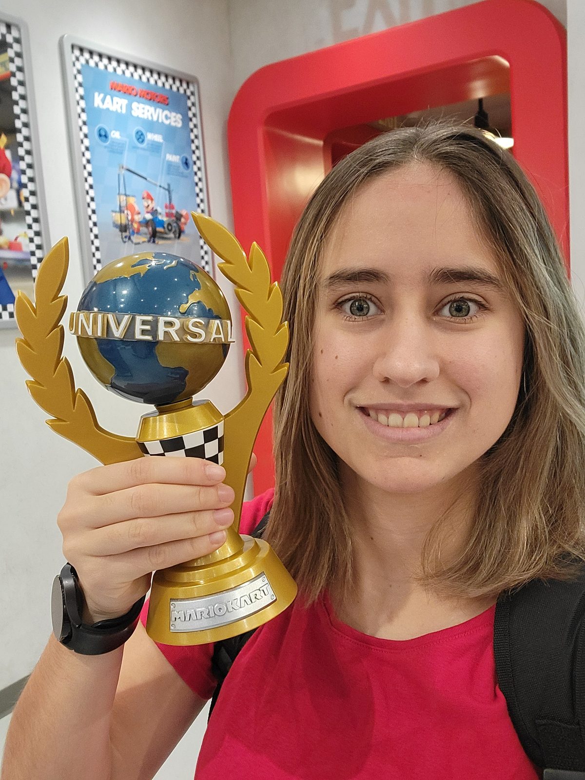 Lisa with a Mario Kart trophy