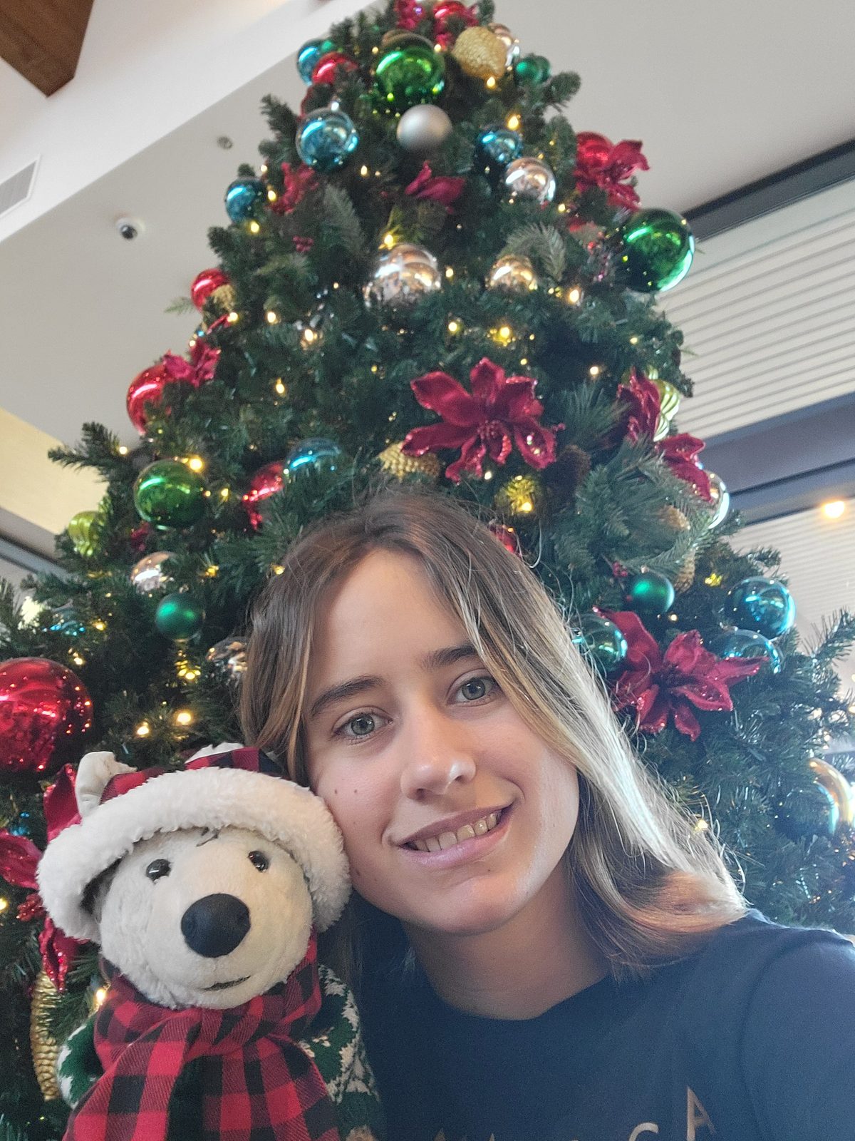 Lisa with the resort's Christmas bear