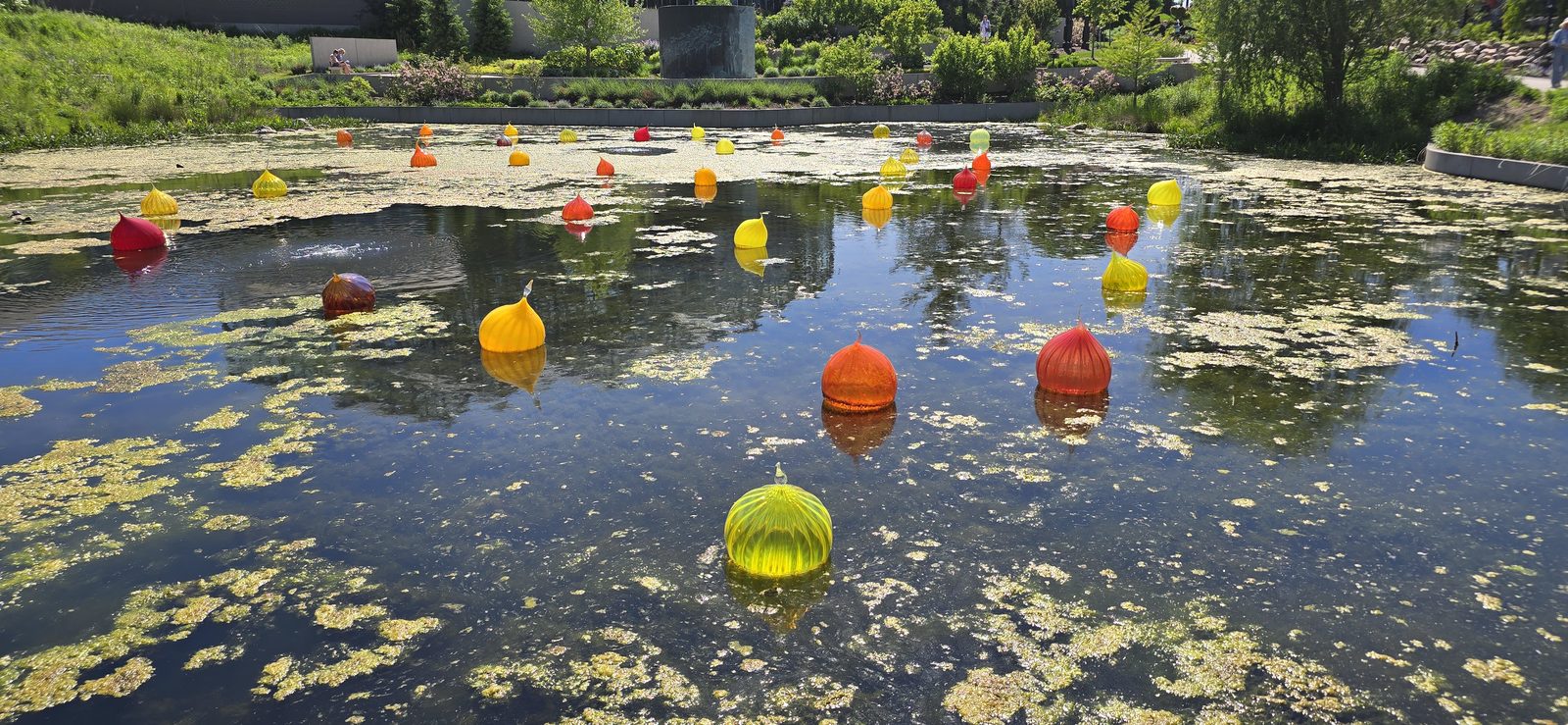 Glass floats on the pond at Meijer Gardens