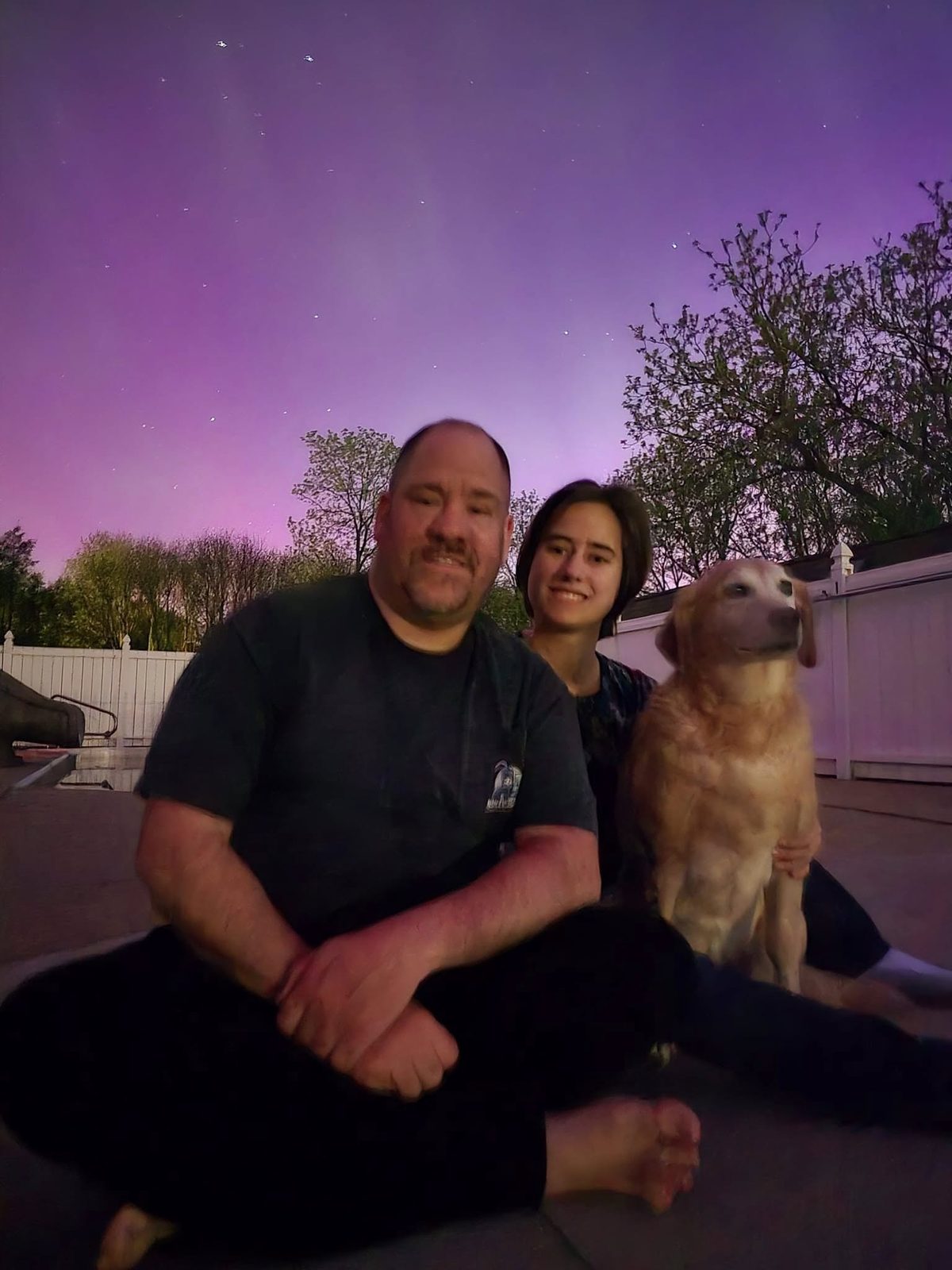 Michael, Lisa and Rocky under the aurora