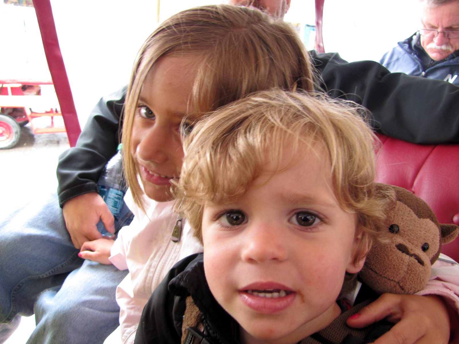 Lisa holding Thomas close on the ferry