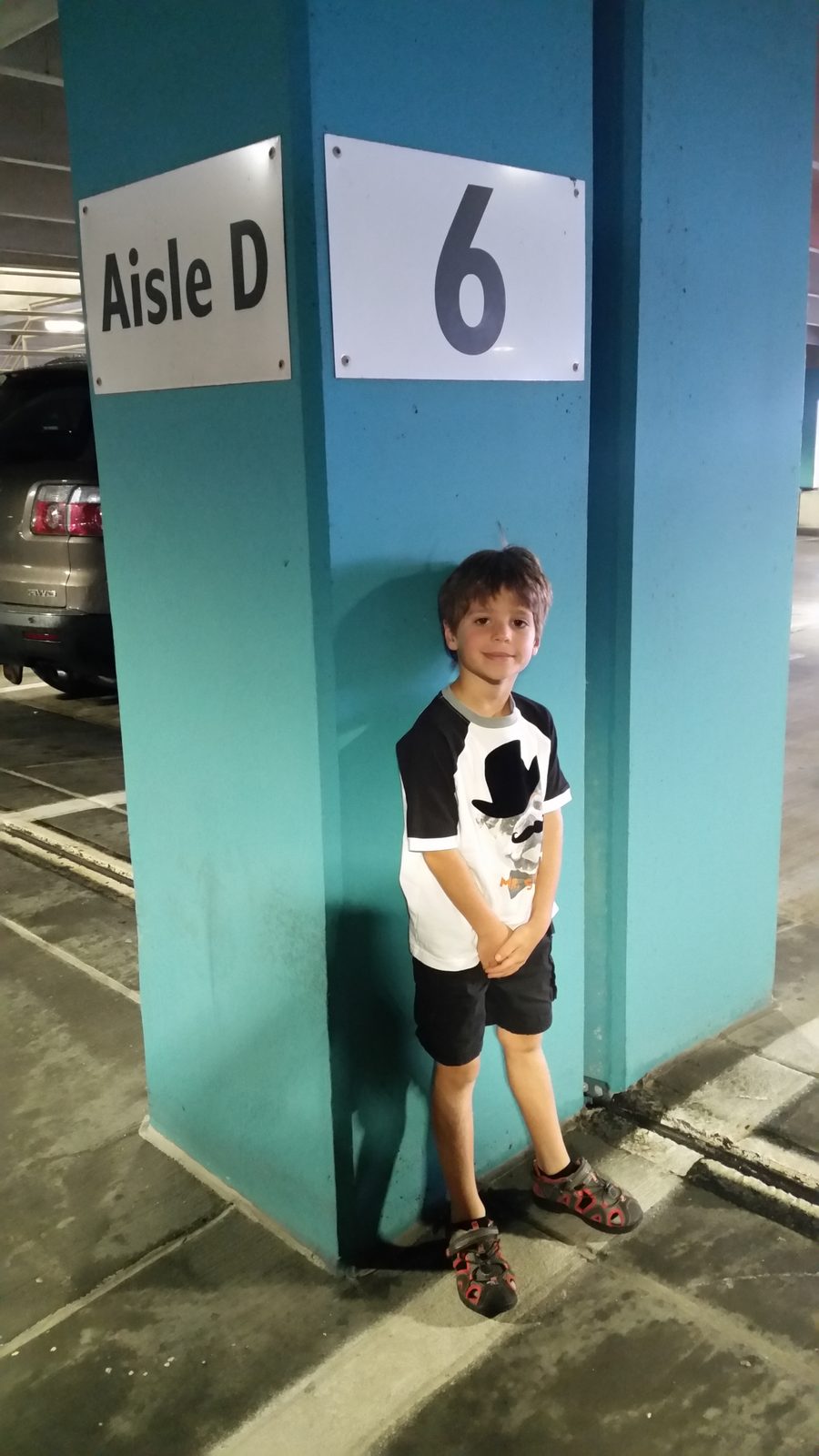Thomas marks the parking spot, Aisle D 6