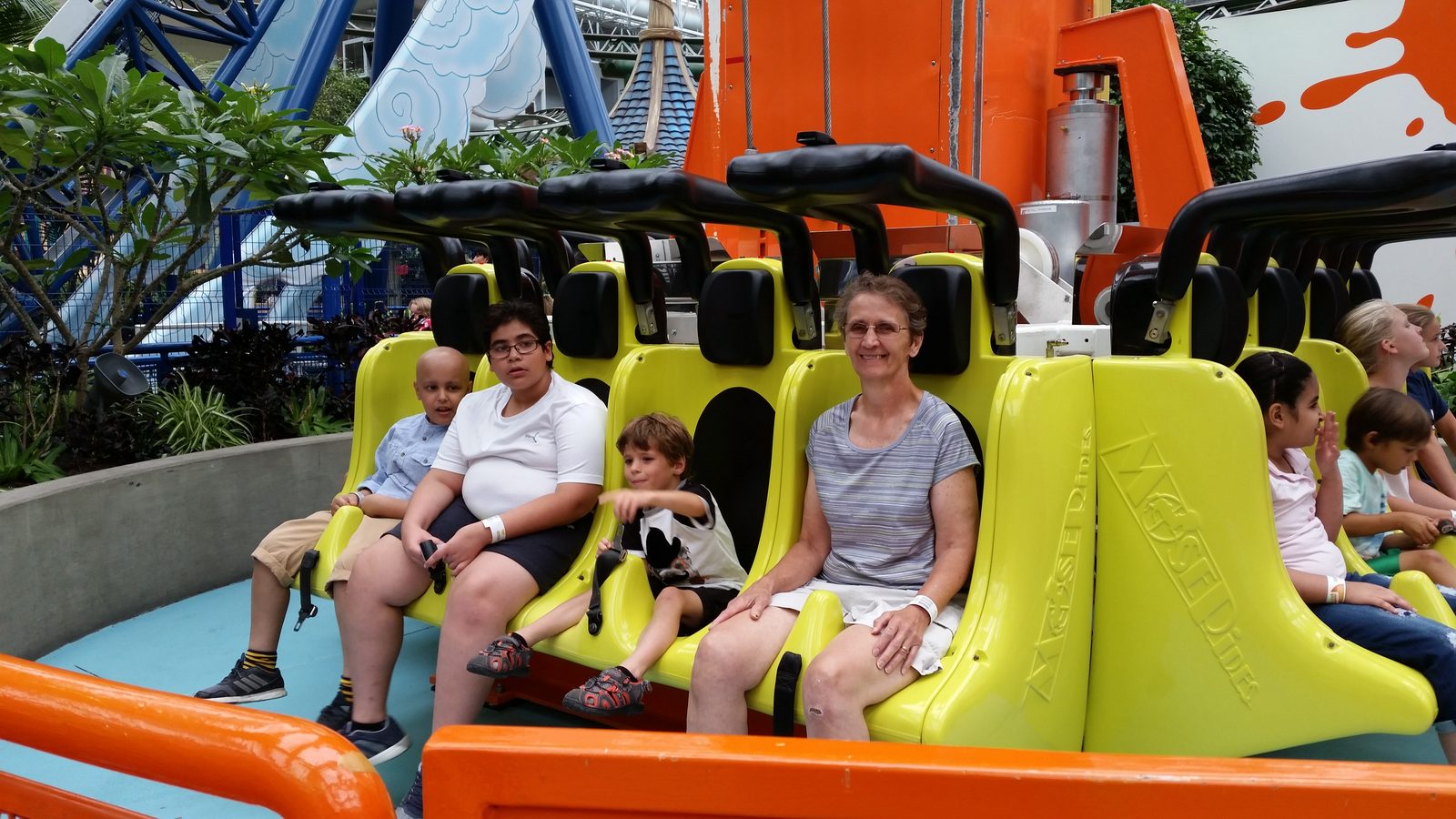 Thomas and Grandma on a ride at Nickelodeon Universe