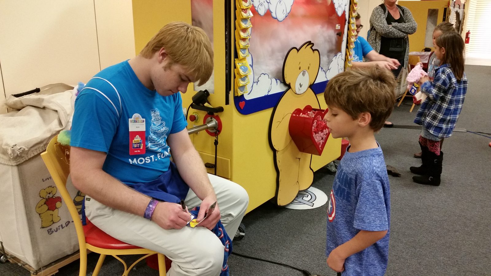 Thomas watching his bear get stuffed
