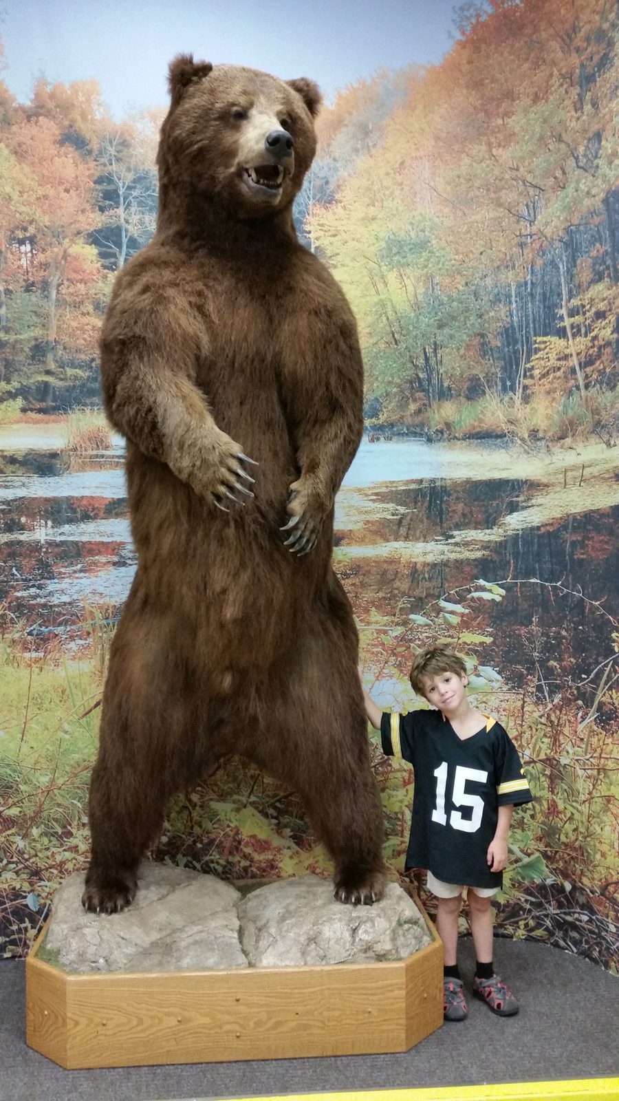A bronze bear towers over Thomas