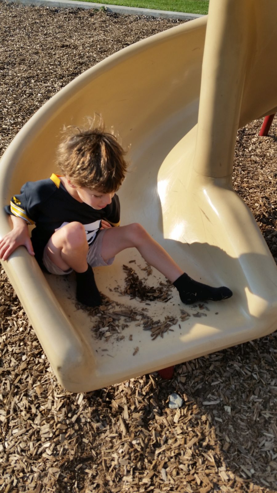 Thomas goes down the spiral slide