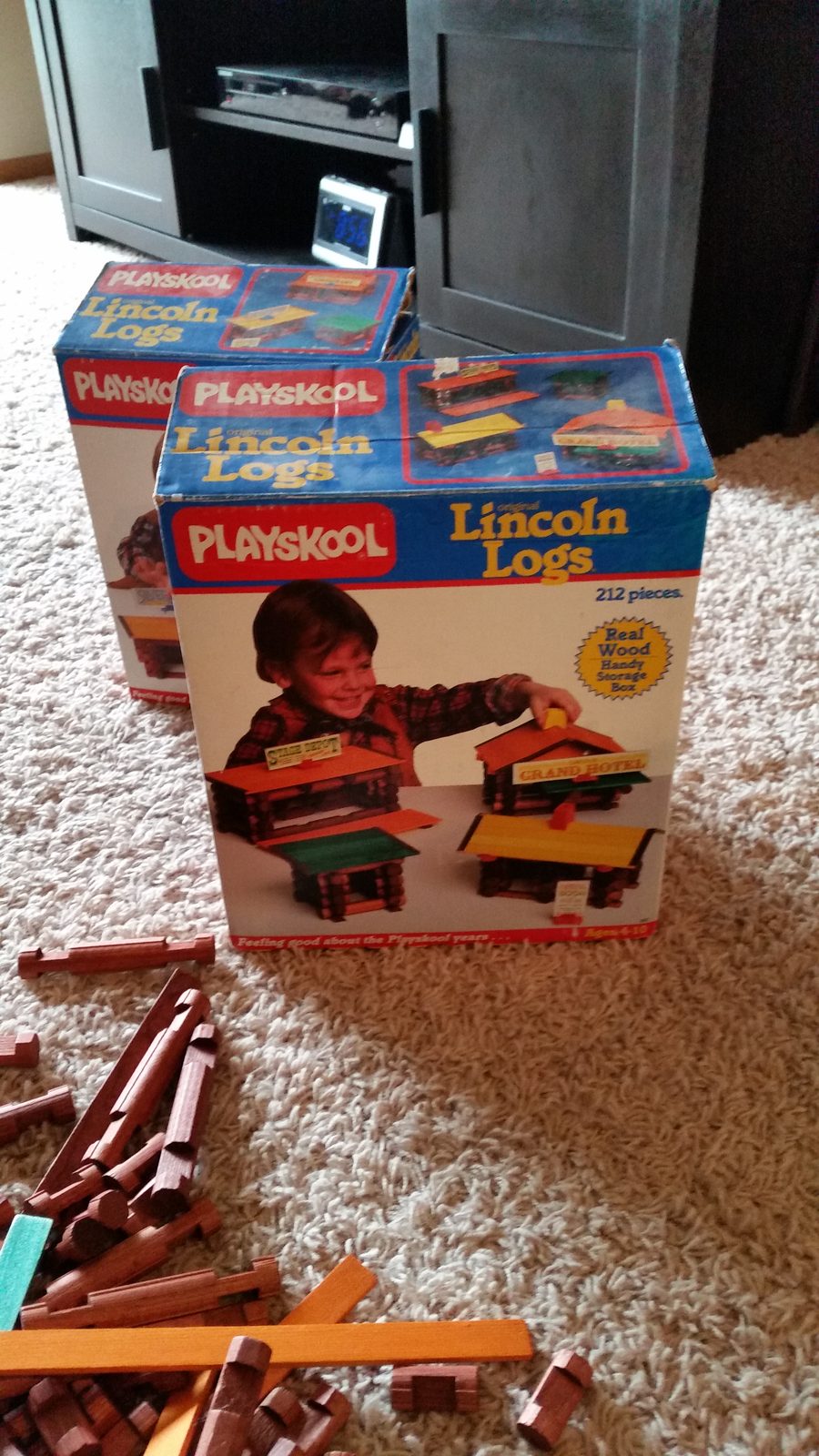 Lincoln Logs spread across the floor