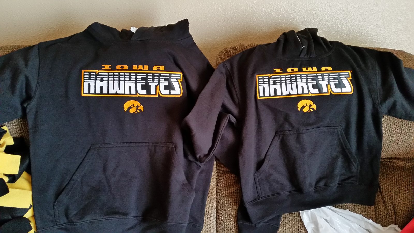 New matching Hawkeyes hoodies laid out