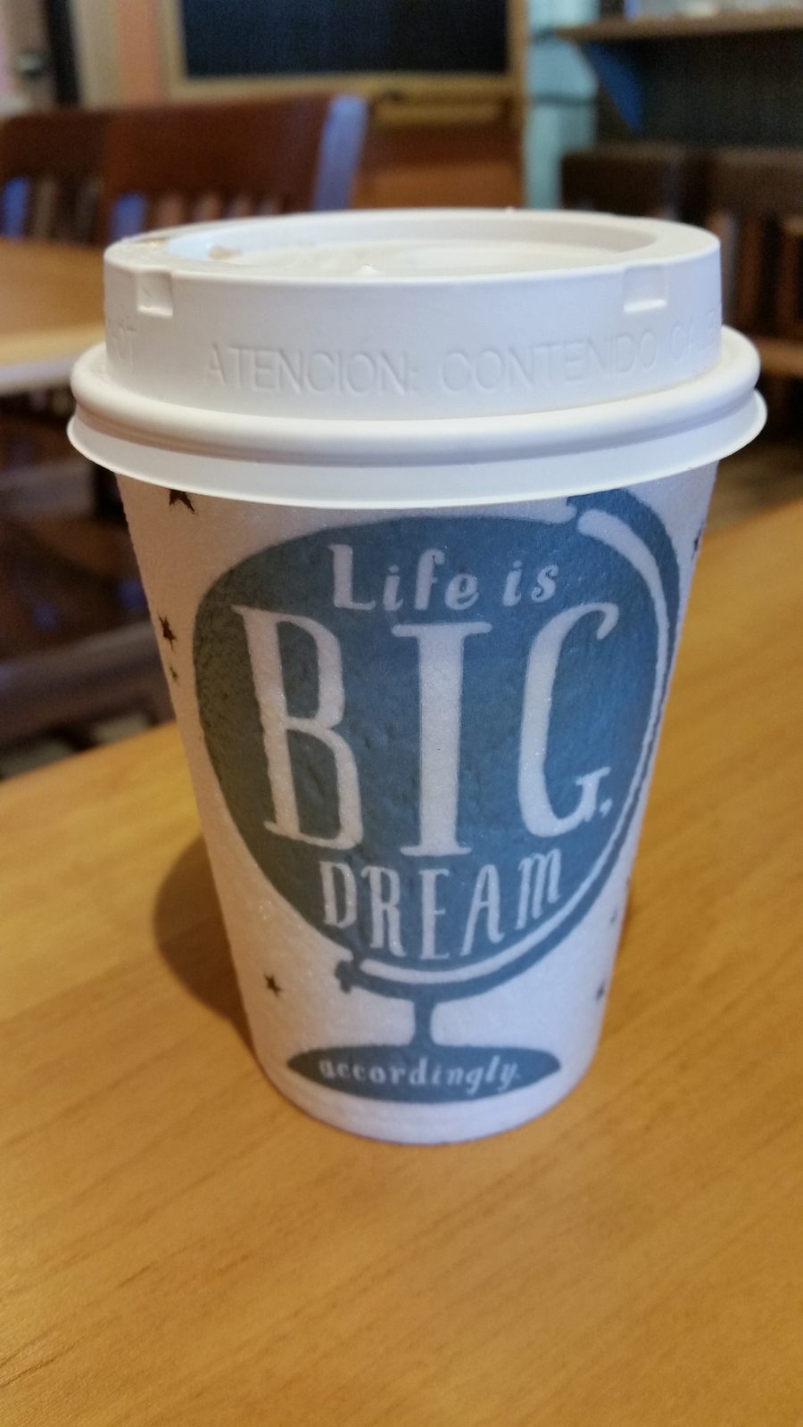 A cup printed Life is Big Dream