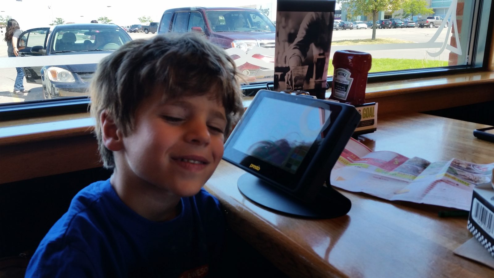 Thomas smiles at the resort table