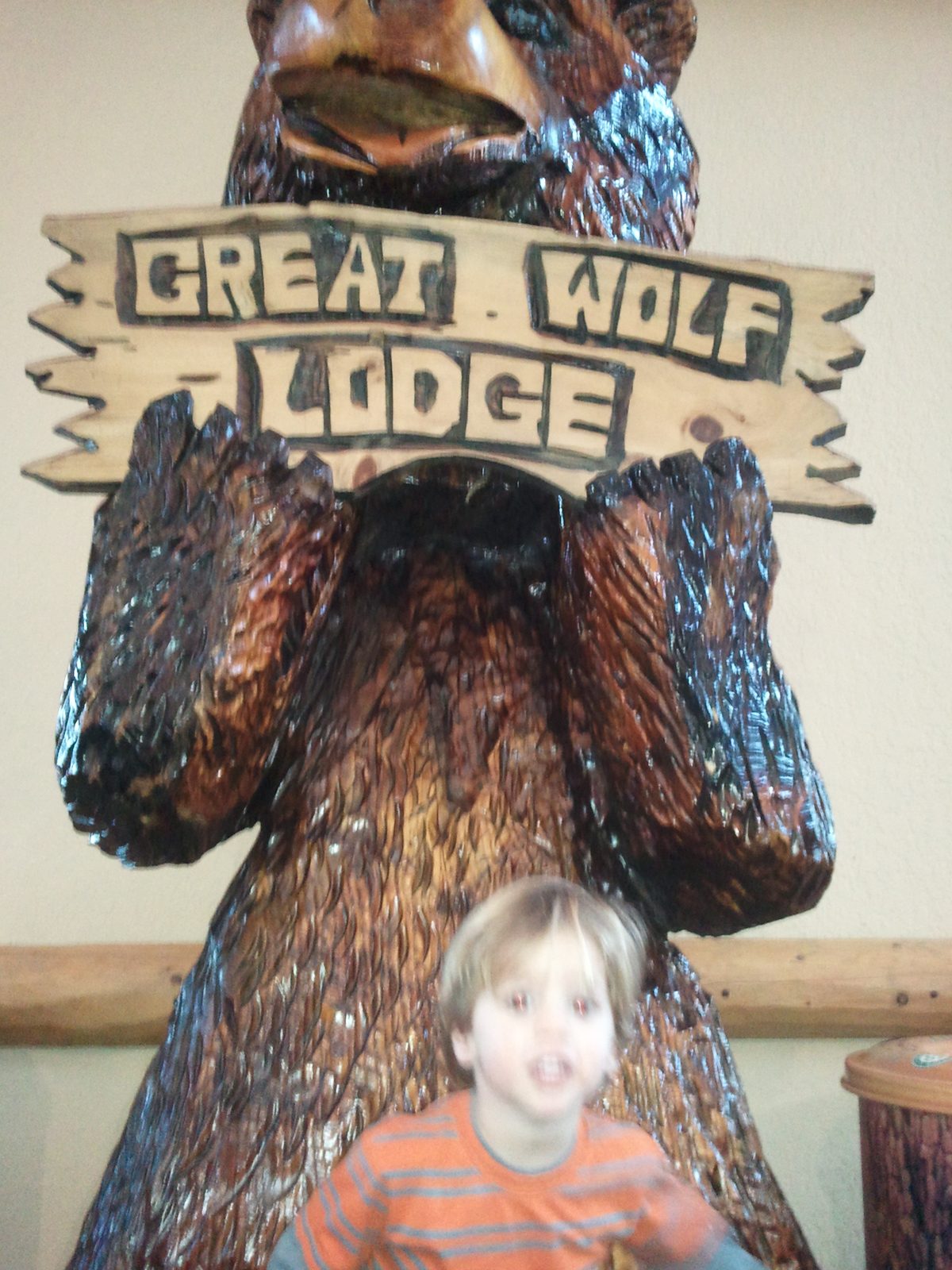 Thomas peeking out from the Great Wolf statue